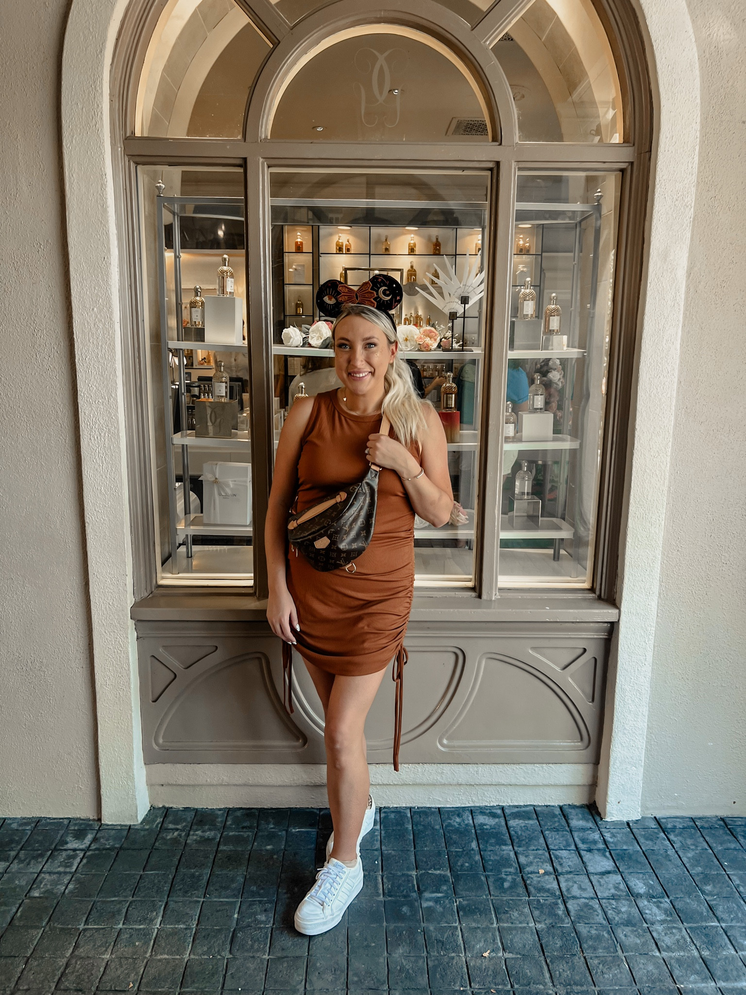 Subtle Halloween themed outfit for a day at the Disney World parks. Wearing my favorite park shoes (iykyk) and a fall colored version of this staple dress. It is so versatile, like realllly versatile. I wore it last year layered under cardigans when I was pregnant and now am wearing it again. The side ruching makes it super adjustable so it’s a little bit magical ✨



#LTKHalloween #LTKmidsize #LTKfindsunder50