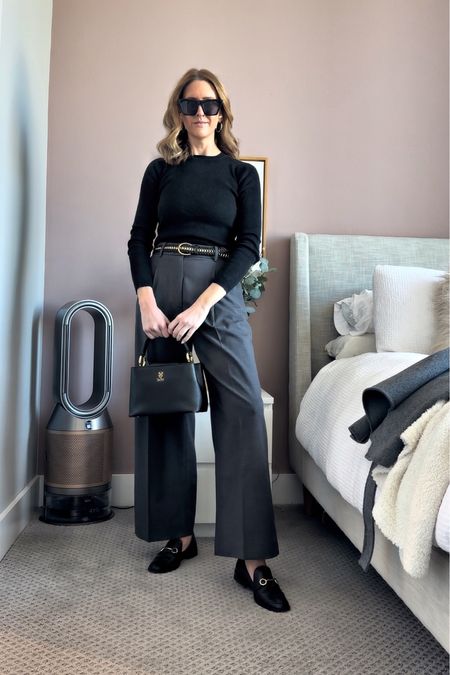 Business casual outfit idea! Grey pleated trousers, black top, black loafers, belt, black bag and black sunglasses 

#LTKfindsunder100 #LTKstyletip