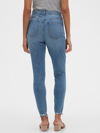 Petite Curvy Mid-Rise Soft Touch Medium Wash Destructed Skinny Jean | Banana Republic Factory