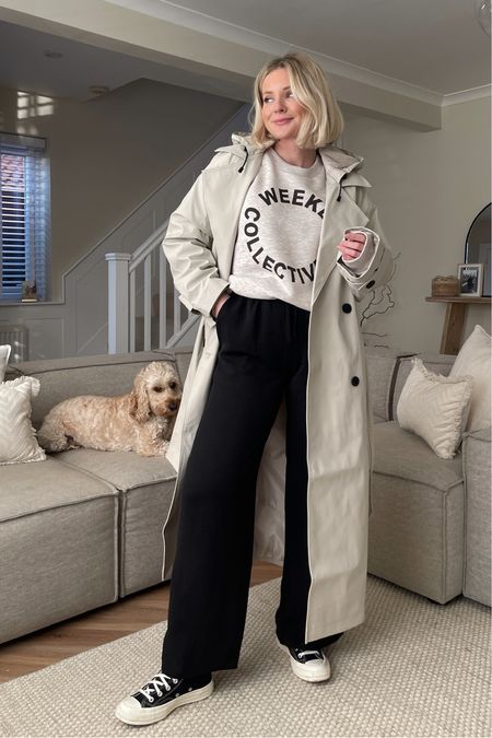 Cosy chic comfortable outfit dressed up to wear out and run errands this winter. Weekend collective logo sweatshirt, elasticated waist smart black joggers, comme des garçons converse & trench coat layered over the top  

#LTKSeasonal #LTKeurope #LTKstyletip