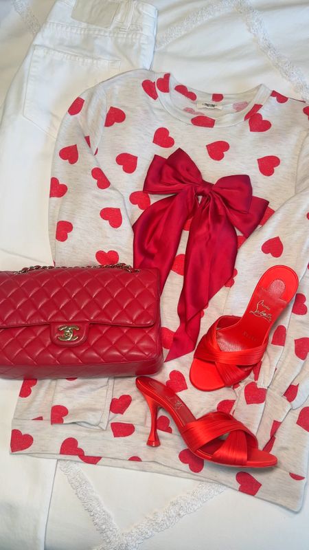 Casual Valentine’s Day. Red, heart top, oversized red satin bow, red Chanel classic flap bag, red Christian Louboutin Nicol is back slide sandals. Mommy and daughter heart sweatshirt. 

#LTKitbag #LTKstyletip #LTKshoecrush