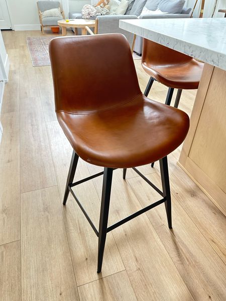 Amazon barstools, kid friendly wipeable and budget friendly mid century modern barstools. Pretty brown faux leather barstools with matte black legs 

#LTKstyletip #LTKfamily #LTKhome