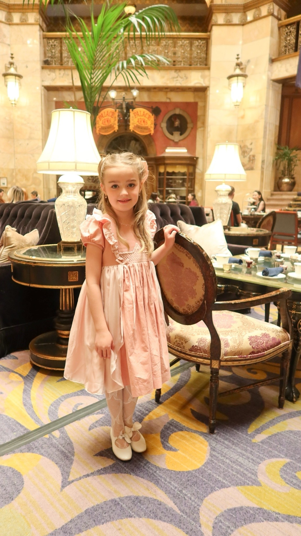 Girlhood 🎀 Gigi celebrated her birthday tea party with a few friends. I think I’m still tired from hosting two different parties in 24 hours… But we had so much fun. Here are my tips and a few things to think about… 

🫖 Space is quite limited, so this is better for a handful of friends. We felt we were at our max with no room left on the table with 10 grandmas/mommies/girls total. 
🫖 We played games that allowed the girls to stay seated like Friendship Bingo to get to know one another and Guess the Tea to pass around fragrant teas to smell. 
🫖 This age loves prizes! Squishies, mini babies, cookbooks, and lip glosses were some of the favorites. 
🫖 I let the girls’ party favors be the decor. There isn’t really any space at the table once the tea trays arrive, so I would avoid bringing any balloons or flowers. 
🫖 We booked a suite to enjoy after tea. My mom, Gigi, and I relaxed, watched movies, and ordered room service. It was a cute way to end her celebration. Don’t forget face masks and cozy robes!

Gigi’s pink dress: @charlotte_sy_dimby