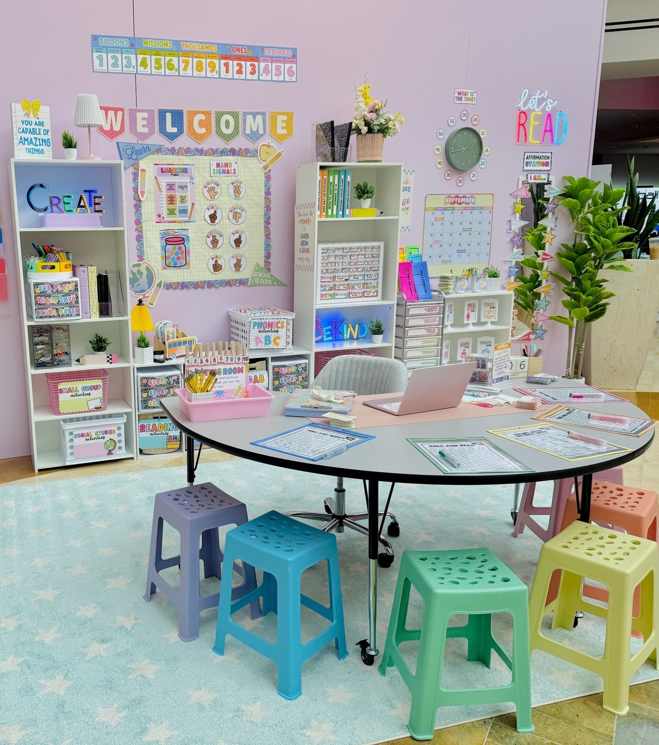 Model Classroom at Get Your Teach On - small group area with colorful stools and bright classroom decor
