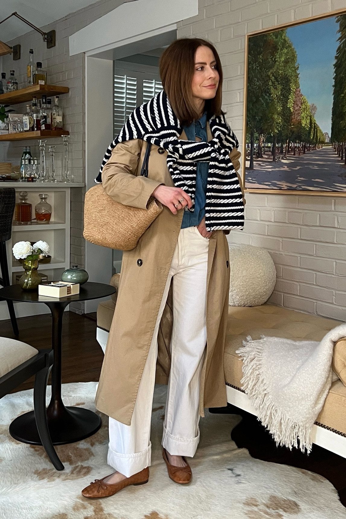How to style a trench coat for Spring:
Citizens of Humanity jeans
Schutz woven flats 
Sezane denim shirt 
Sezane woven tote 

#LTKSeasonal #LTKstyletip