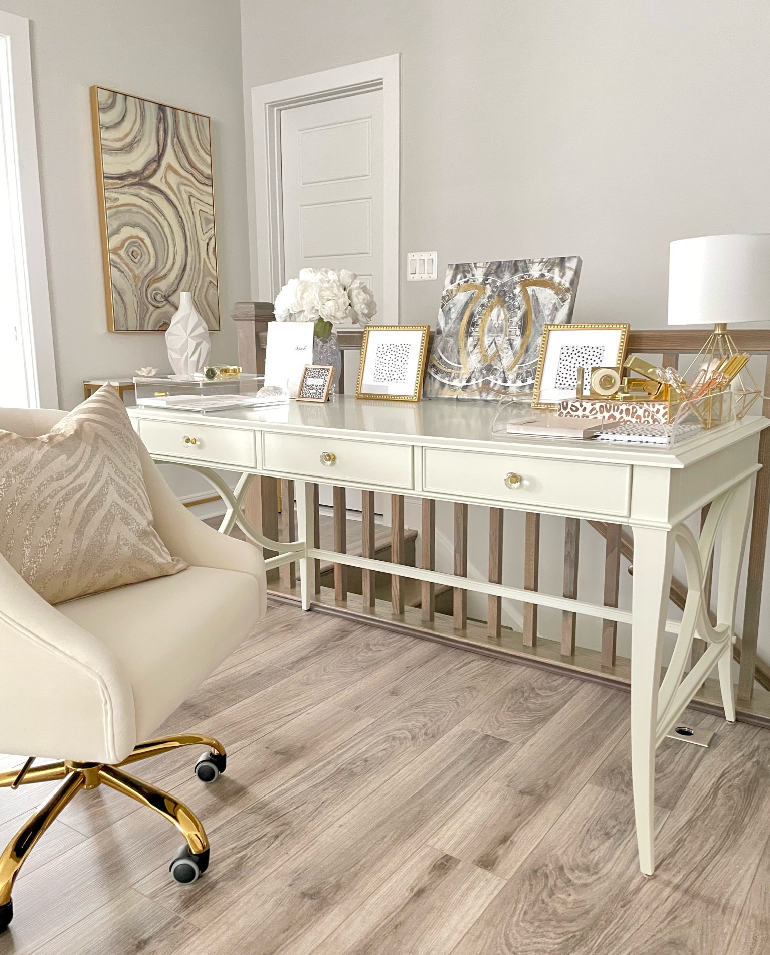 My desk and office chair are both on sale for a few more days. The “double C” Chanel inspired wall art propped on the middle of the desk is $30 less than when I purchased it. Take advantage of the savings before the prices go up!

#LTKhome #LTKsalealert #LTKFind
