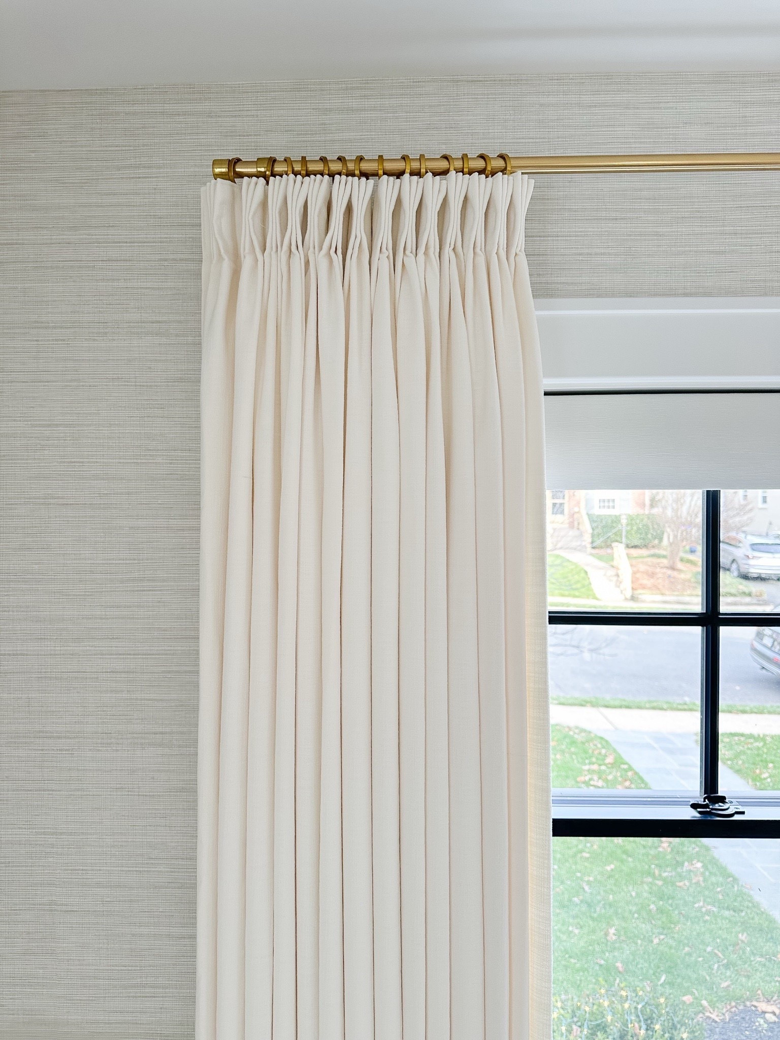Curtain Details:
TWOPAGES Isabella Custom Curtains
Color: Off White/Creamy White 7084-5
Hanging Header Style: Triple Pleat
Width: 75" wide
Length (Height): 90” long
Lining: Room Darkening Liner, 140GSM
Body Memory Shaped: Yes

Curtain Rod & Hardware Details:
Finish: Brass
Diameter: 0.75”
Rings: 0.75” (1 1/2” diameter)

Wallpaper, light gray wallpaper, grasscloth look wallpaper

#LTKFindsUnder100 #LTKHome