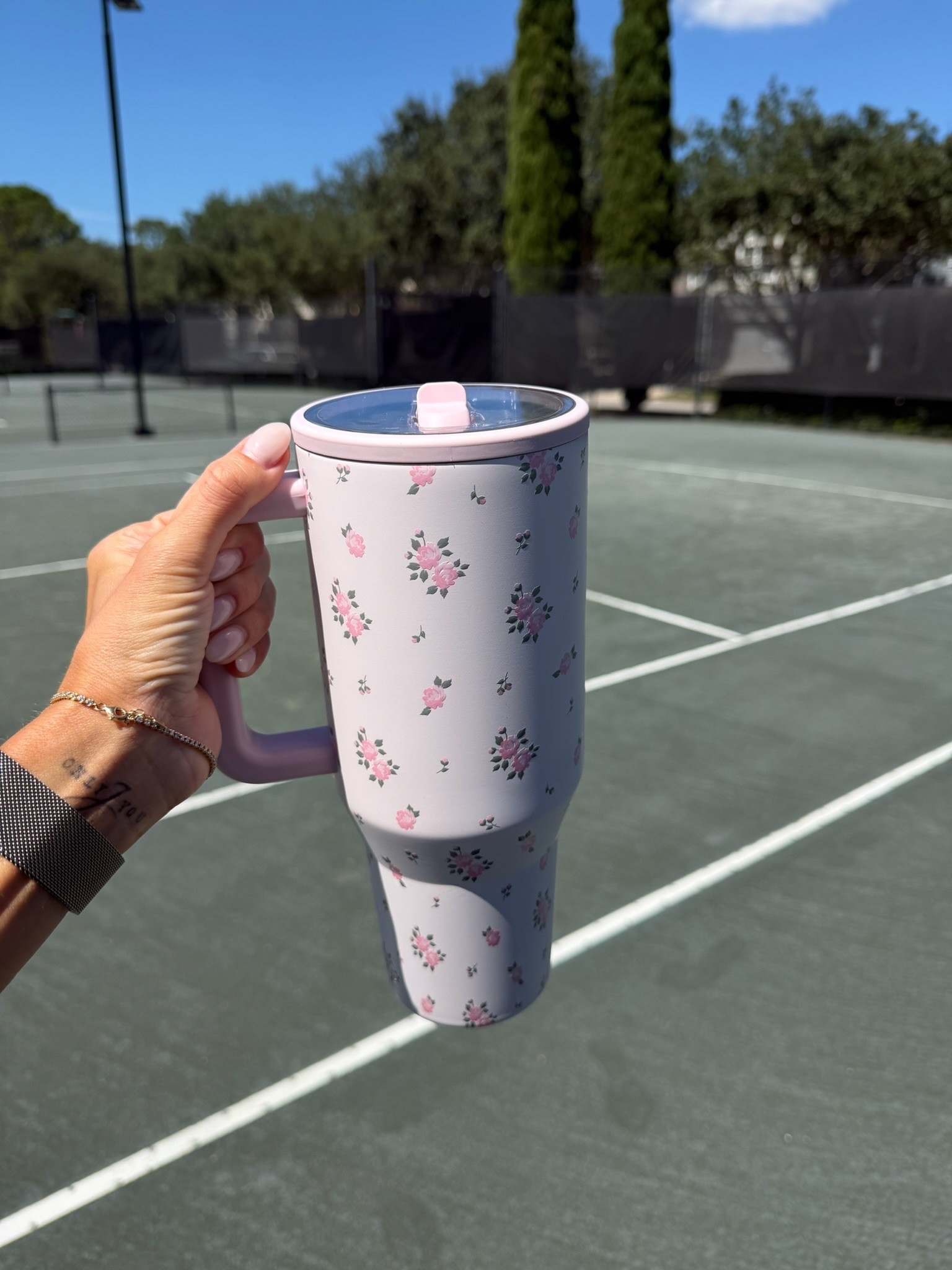 This floral tumbler has been coming everywhere with me lately. I love the oversized handle, cup holder friendly shape, and the print makes it way more fun to carry around for workouts, errands, or long days out.

floral tumbler, insulated tumbler, travel cup, handled tumbler, cup holder friendly, water cup, workout essentials, everyday essentials, hydration, reusable tumbler, annabrstyle

#LTKootd #LTKOver40 #LTKSeasonal