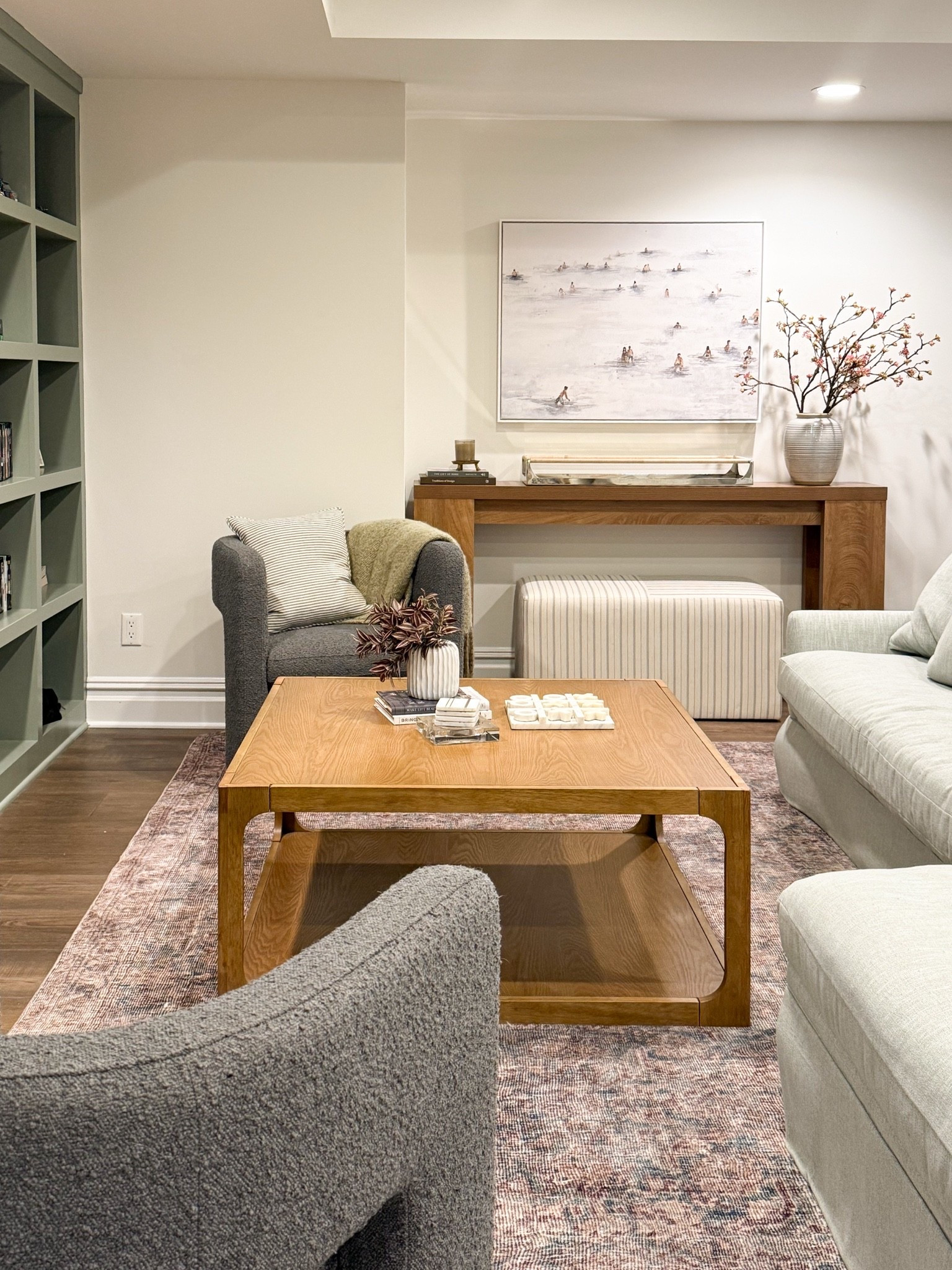 This rug adds the perfect layer of warmth and color to our basement family room. I love the muted blend of soft mauve, blue, and neutral tones, which gives the space a cozy, lived-in feel while still feeling elevated. The subtle vintage inspired pattern hides everyday wear beautifully, making it an ideal choice for a space where we relax, entertain, and spend time together.
Basement family room rug, vintage inspired rug, mauve area rug, neutral area rug, family room rug, Loloi rug, cozy home décor, timeless interiors, durable area rug, living room rug, GirlOnTheHudson

#LTKHome #LTKSeasonal #LTKOver40