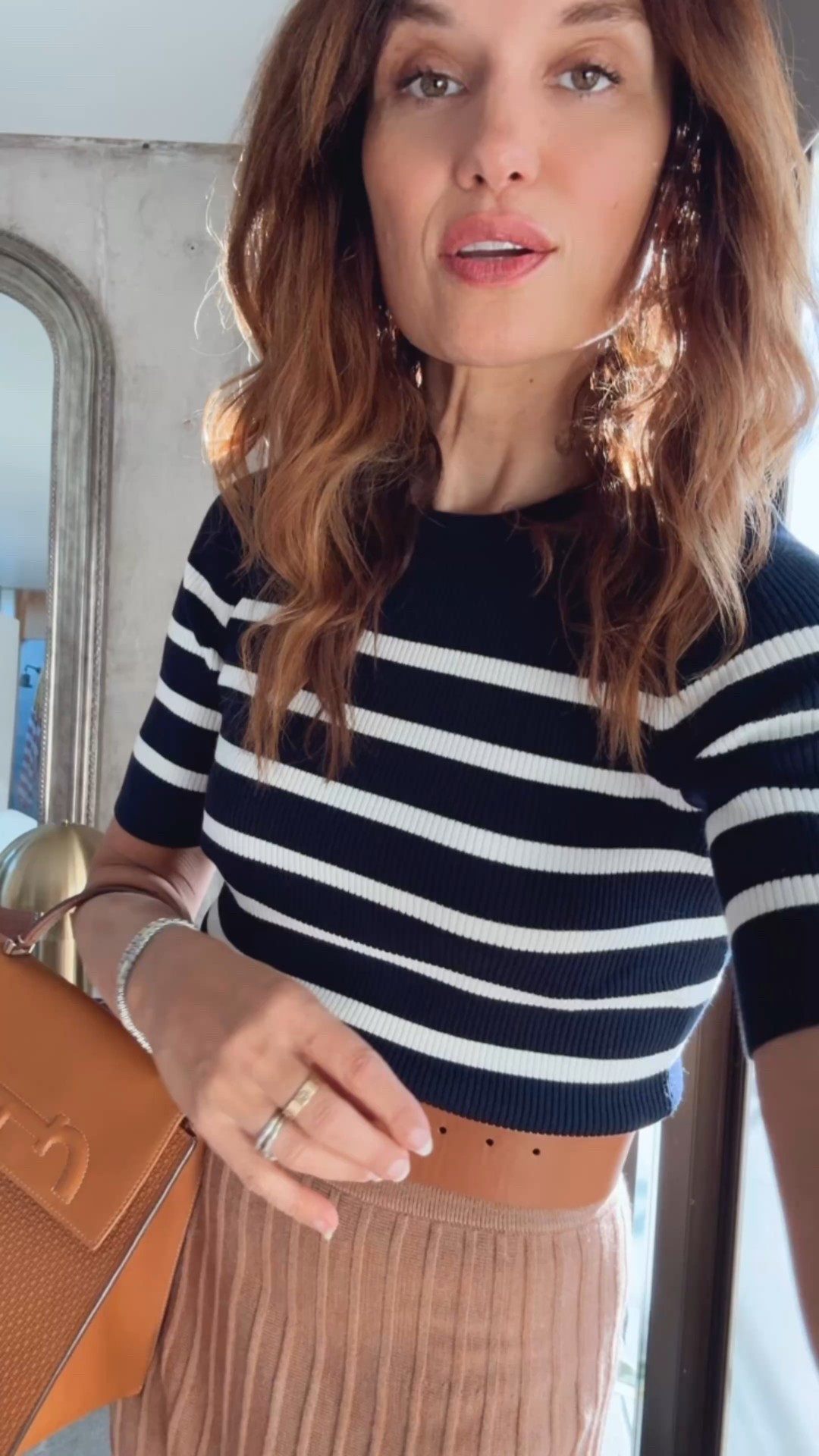 Talbots try on
XS top 
Fit & flare skirt very flattering in size. Small
 sneakers are true to size. 