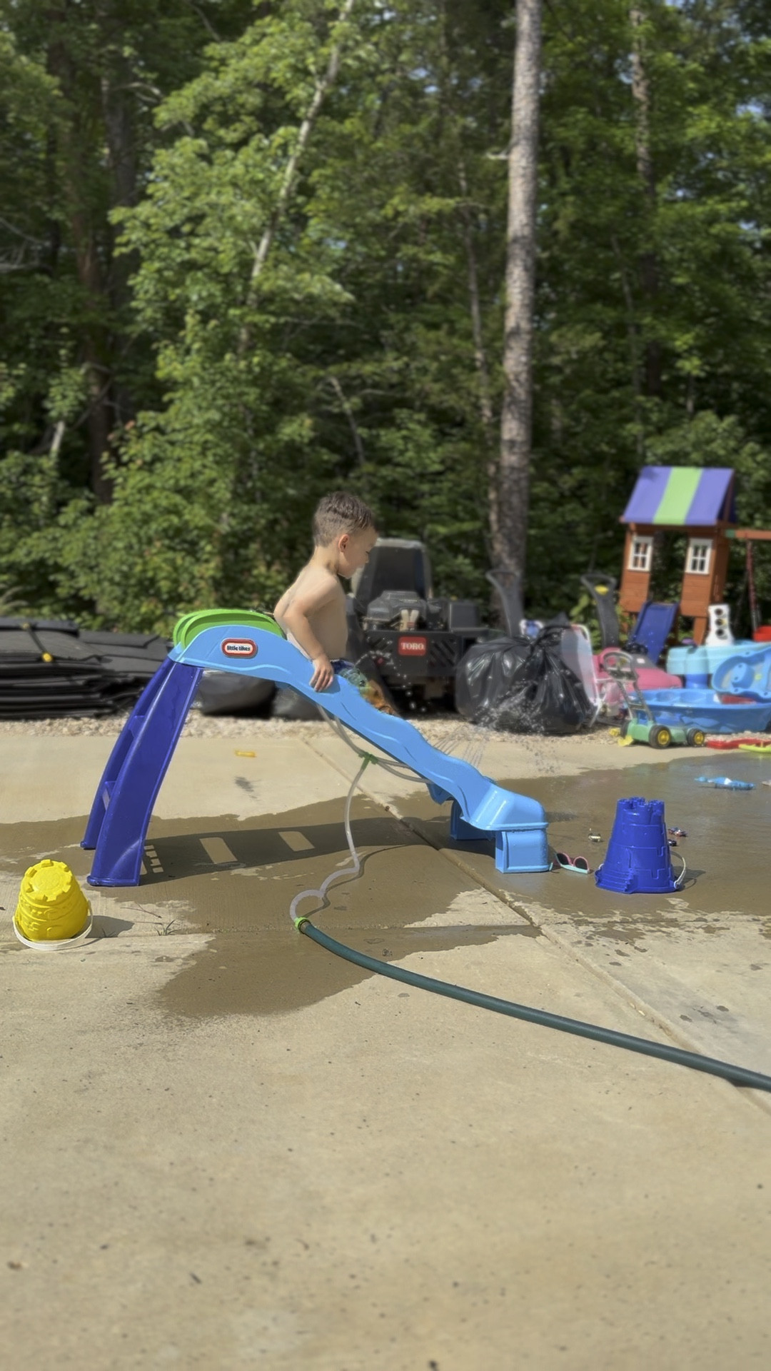 Summer water slide fun 

#LTKKids