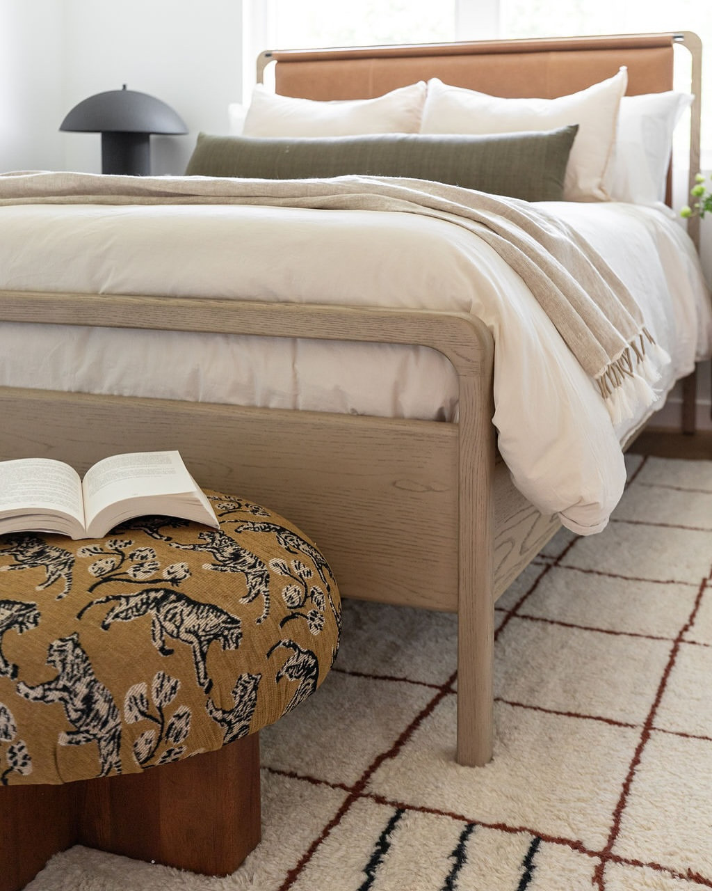 Earthy tones, layered textures, and playful details and bedroom decor make this cozy bedroom feel warm, inviting, and effortlessly styled. 

Rug
Nightstands 
Table lamp
Organic modern decor
ottoman 

 #LTKHome #LTKFindsUnder100 #LTKStyleTip