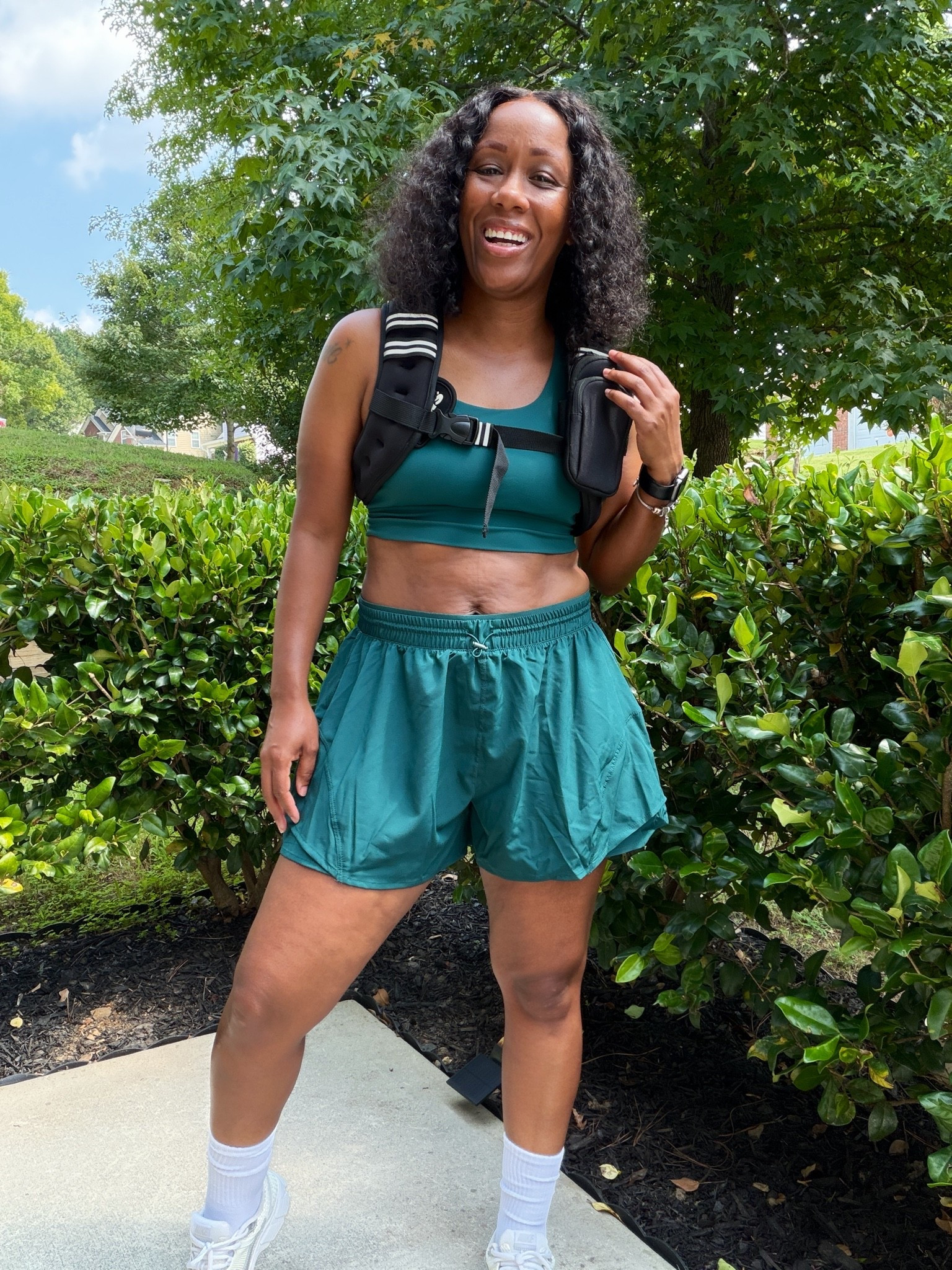 I’m wearing a green sports bra and green running shorts with a weighted vest, white socks and sneakers for a 10,000-step walk.

#LTKActive #LTKOver40 #LTKootd