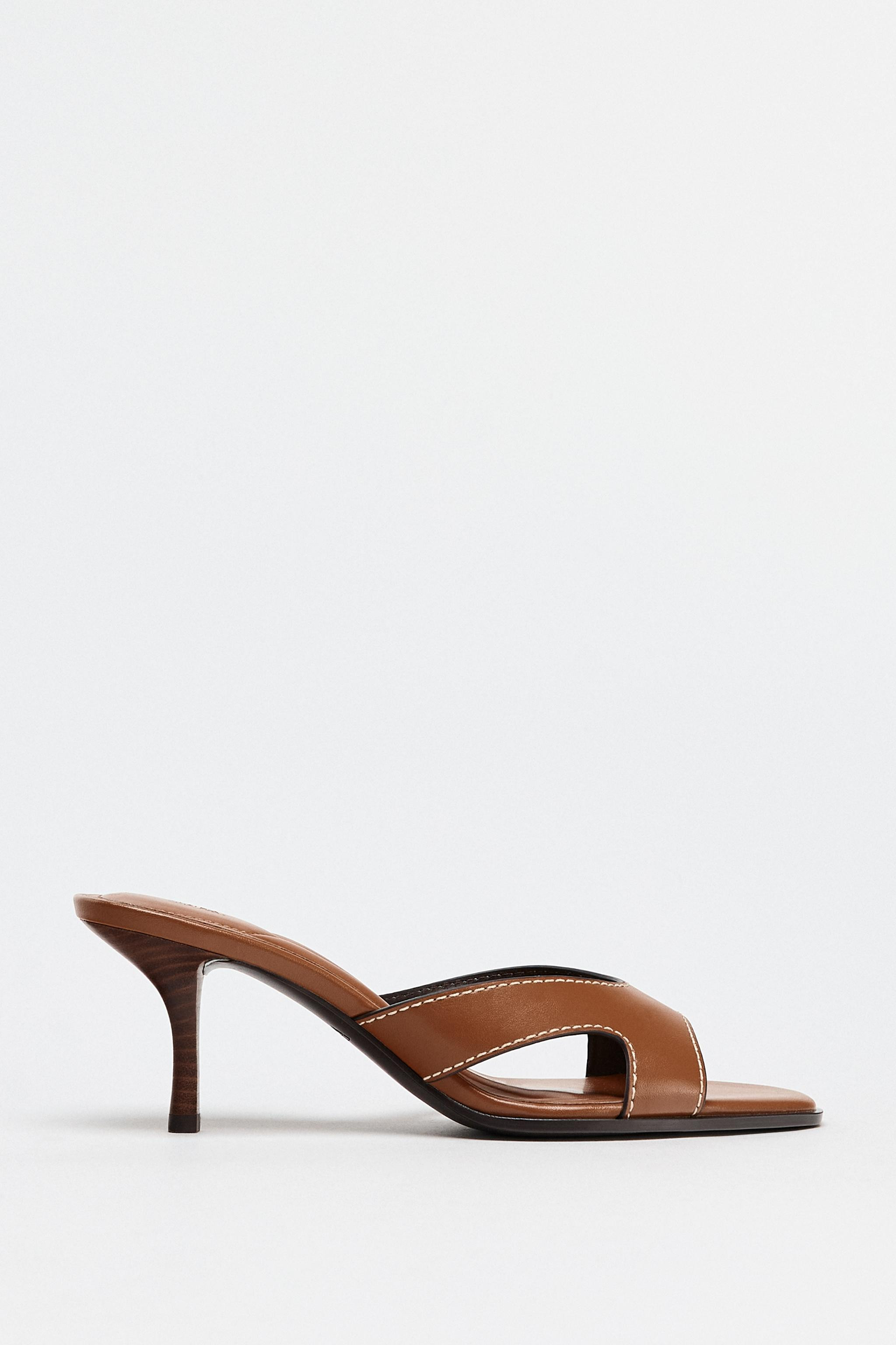 Heeled sandals. Strappy upper with topstitching detail. Stiletto high heel. Square toe. Heel heig... | Zara US