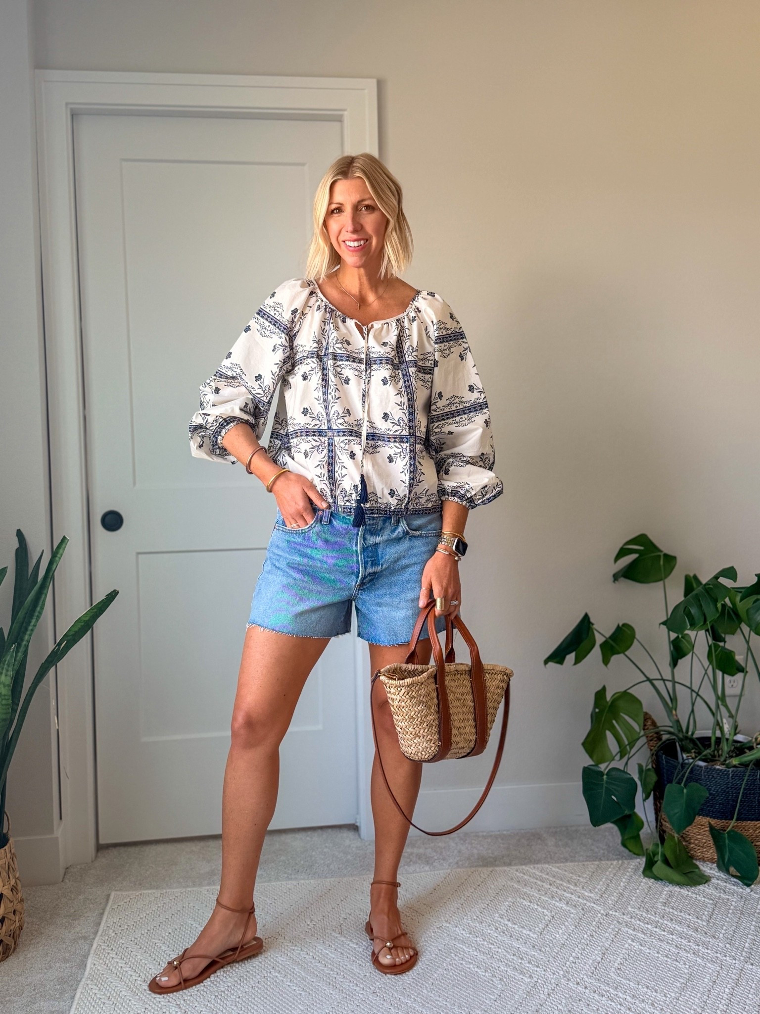 The easiest way to make denim shorts feel polished over 40: pair a relaxed fit with an elevated blouse, simple sandals, and a structured summer bag.

My fit tip: go up one size in your denim shorts so they skim through the thighs instead of gripping or riding up. That little bit of ease makes all the difference.

Linked my outfit details here — including similar denim shorts, blouse, sandals, and woven bag.

#LTKootd #LTKSeasonal #LTKOver40