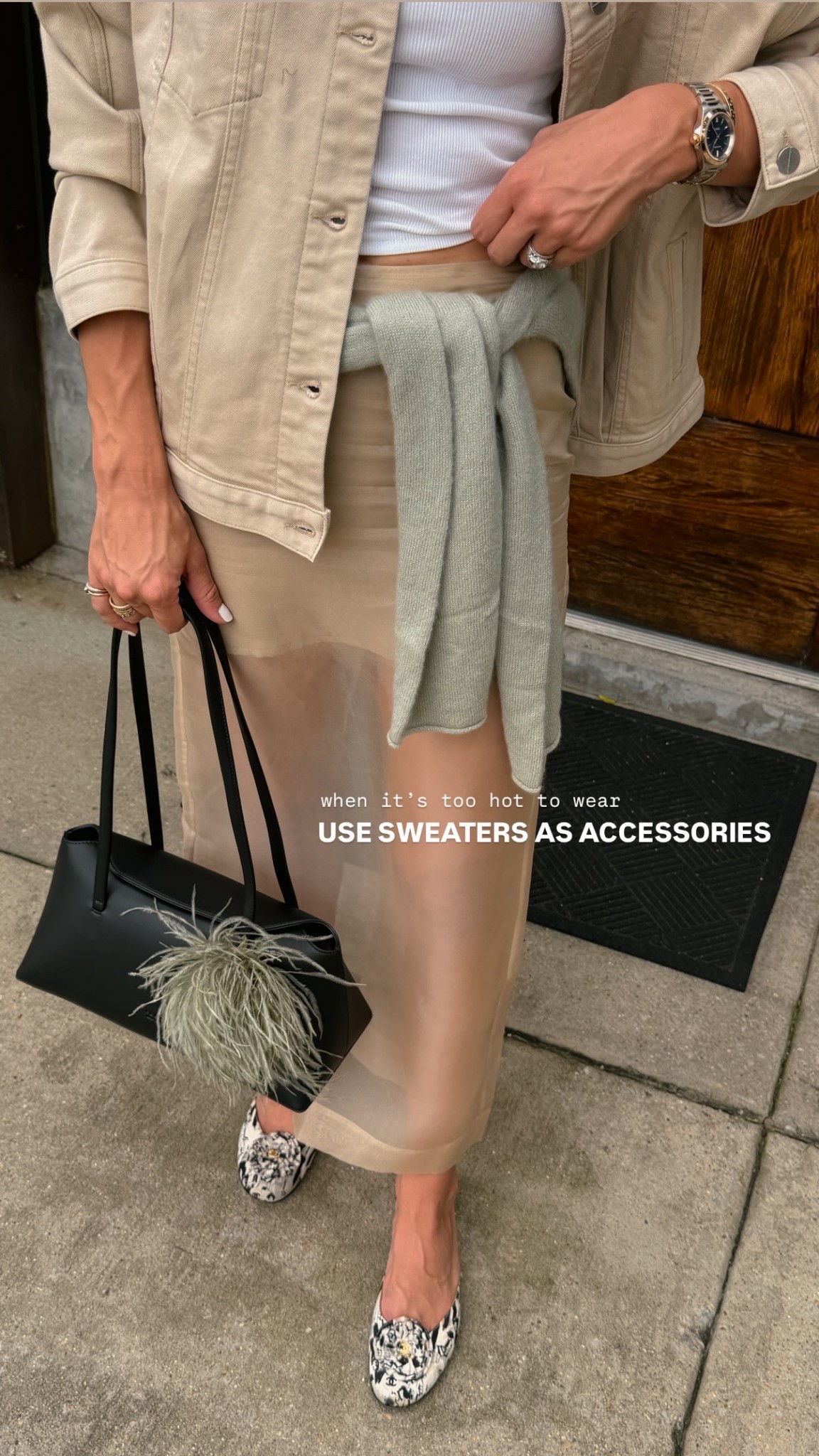 USE SWEATERS AS ACCESSORIES when it’s too hot to wear