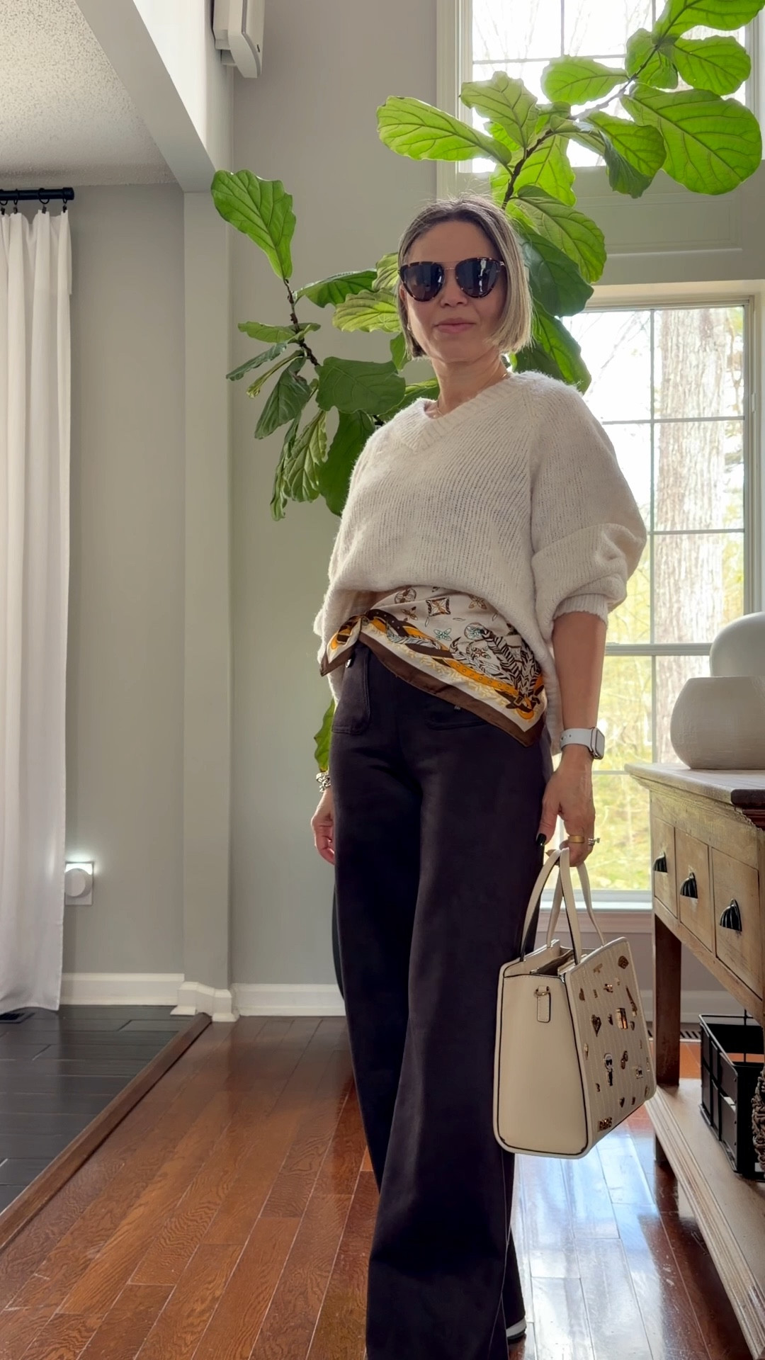 spring outfits 2026
Casual Sunday outfit, cream oversized sweater paired with chocolate brown Jersey pants, satin scarf tied at the waist for a fun addition, cream bag and sneakers .


#casualoutfit #casual #outfit #over50 #streetstyle 

#LTKSeasonal #LTKPetite #LTKOver40