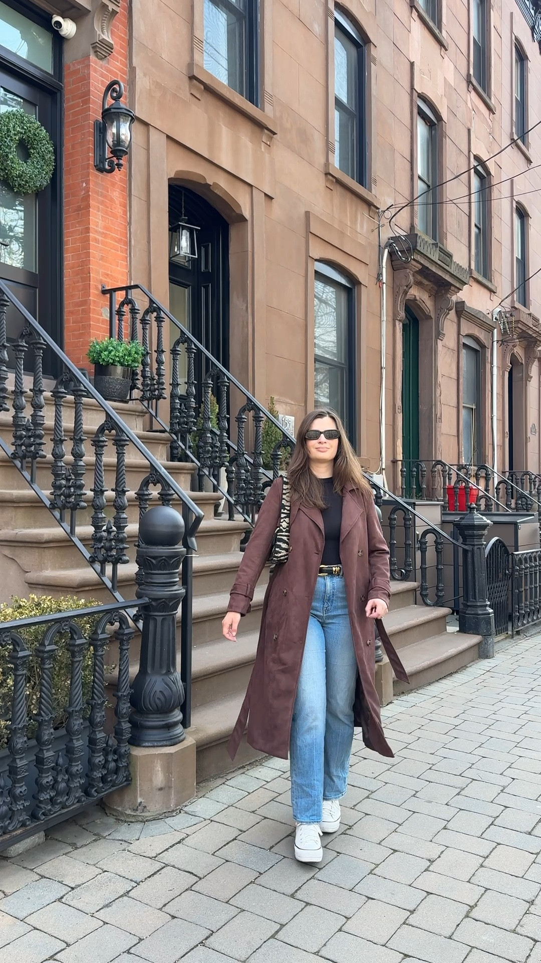 My go to spring outfit! Brown faux suede trench coat with jeans from Madewell an hi top Converse sneakers. I mix it up with the accessories and this time went with a beaded zebra bag  

#LTKSeasonal #LTKootd