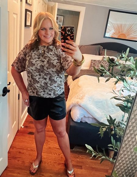 You guys! Meet one of the most versatile tops out there. 
It has the cutest open back (see 2nd photo). It’s oversized and flowy. I have it paired here with a super flattering pair of  faux leather shorts. It also looks fantastic with jeans or white pants. Runs true to size and has an oversized fit.
Work outfits, summer outfits, leather shorts, affordable outfits, Loft, Tory Burch, sale

#LTKSaleAlert #LTKFindsUnder50 #LTKSeasonal