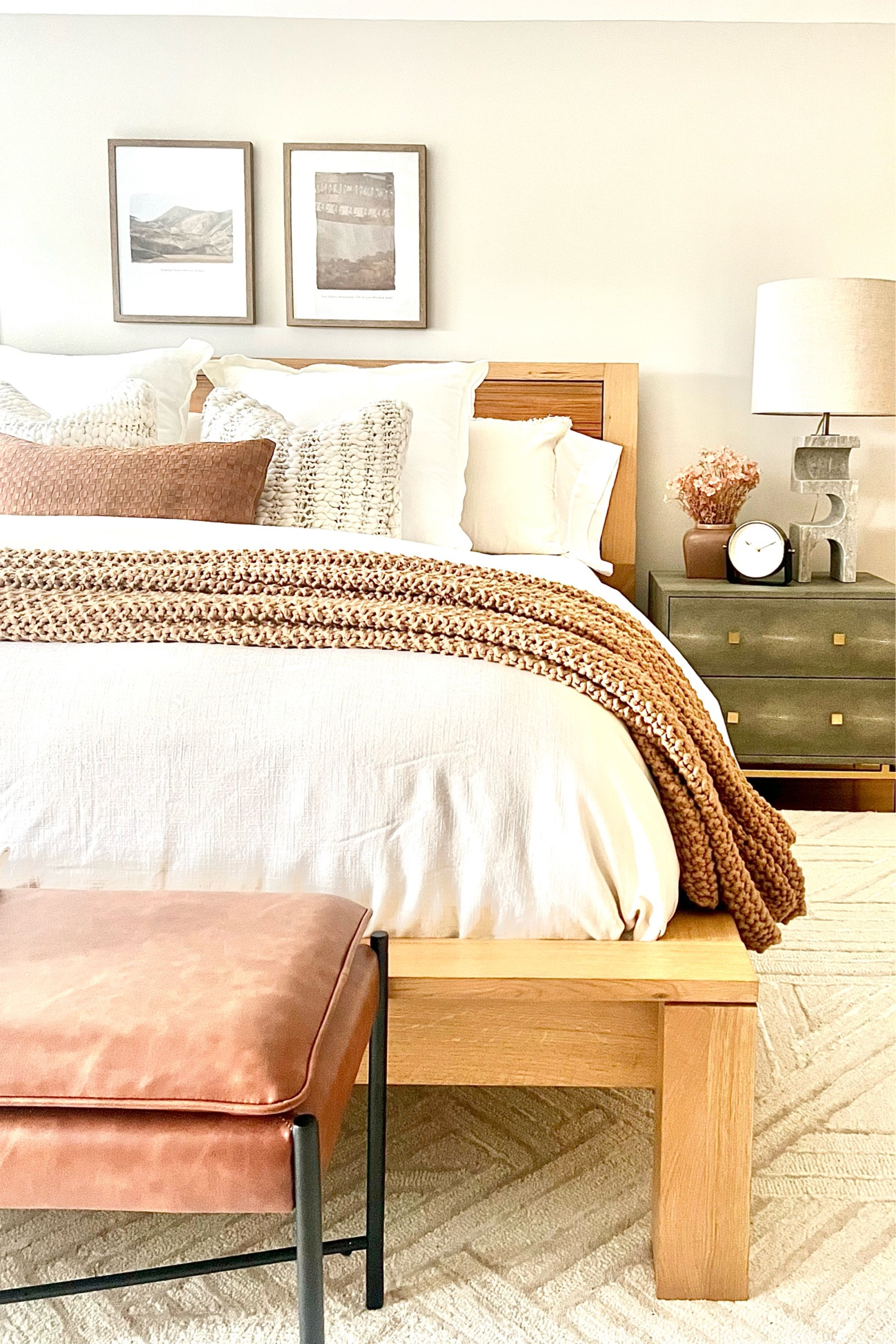Bedroom decor! 
Table lamps, chunky knit pillow cover, night stand, light fixture, leather bench, chunky knit bed blanket, linen duvet cover, cream area rug, brown ceramic vase, linen throw, pillow cover, photo frames.

#LTKhome #LTKsalealert #LTKFind