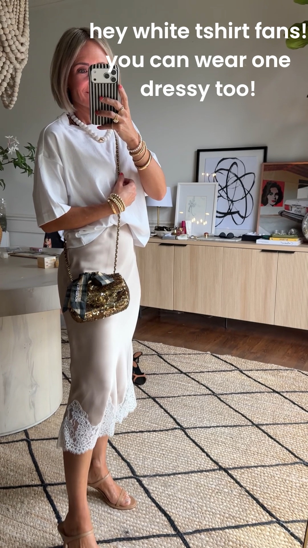 Need an outfit idea for a dressy Spring event?  Grab a silk skirt and a fresh white tee.  This one is $15 runs true to size and i love the fit! Add a bold necklace that doesn’t stand out, a neutral shoe to elongate the leg and a fun bag to finish the look!
wear this to Mother’s day brunch or graduation events! 

#LTKootd #LTKMothersDay #LTKOver40