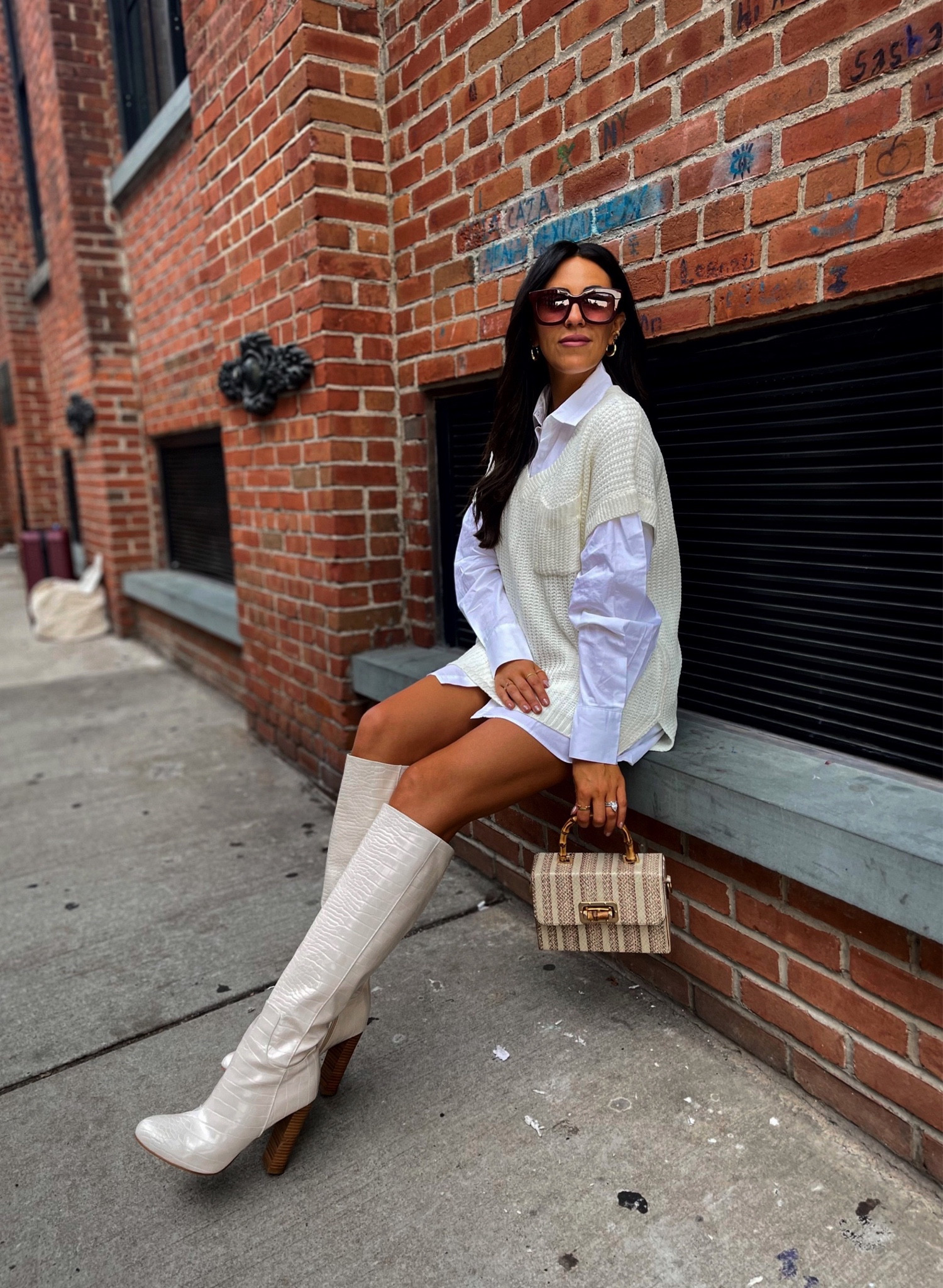 Fall outfit style— sweater vest, button up dress, red sunglasses, white heel boots 👢 

#LTKshoecrush #LTKSeasonal #LTKstyletip