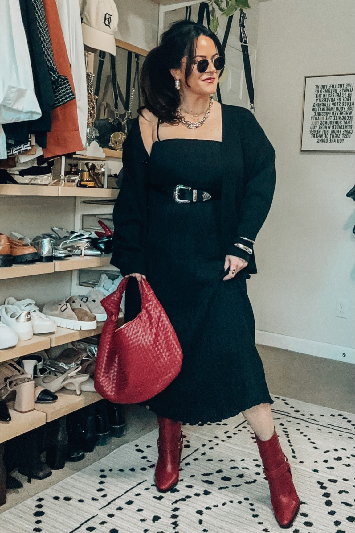 Midsize fall outfit inspo- edgy outfit 
Black dress xl 
Cardigan xl 
Red and oven shoulder bag 
Red moto boot tts on sale 
Western belt xl 
Bangle bracelets 
Amazon earrings 
Kiss proof lip color - shade pda 

#LTKSeasonal #LTKstyletip #LTKmidsize