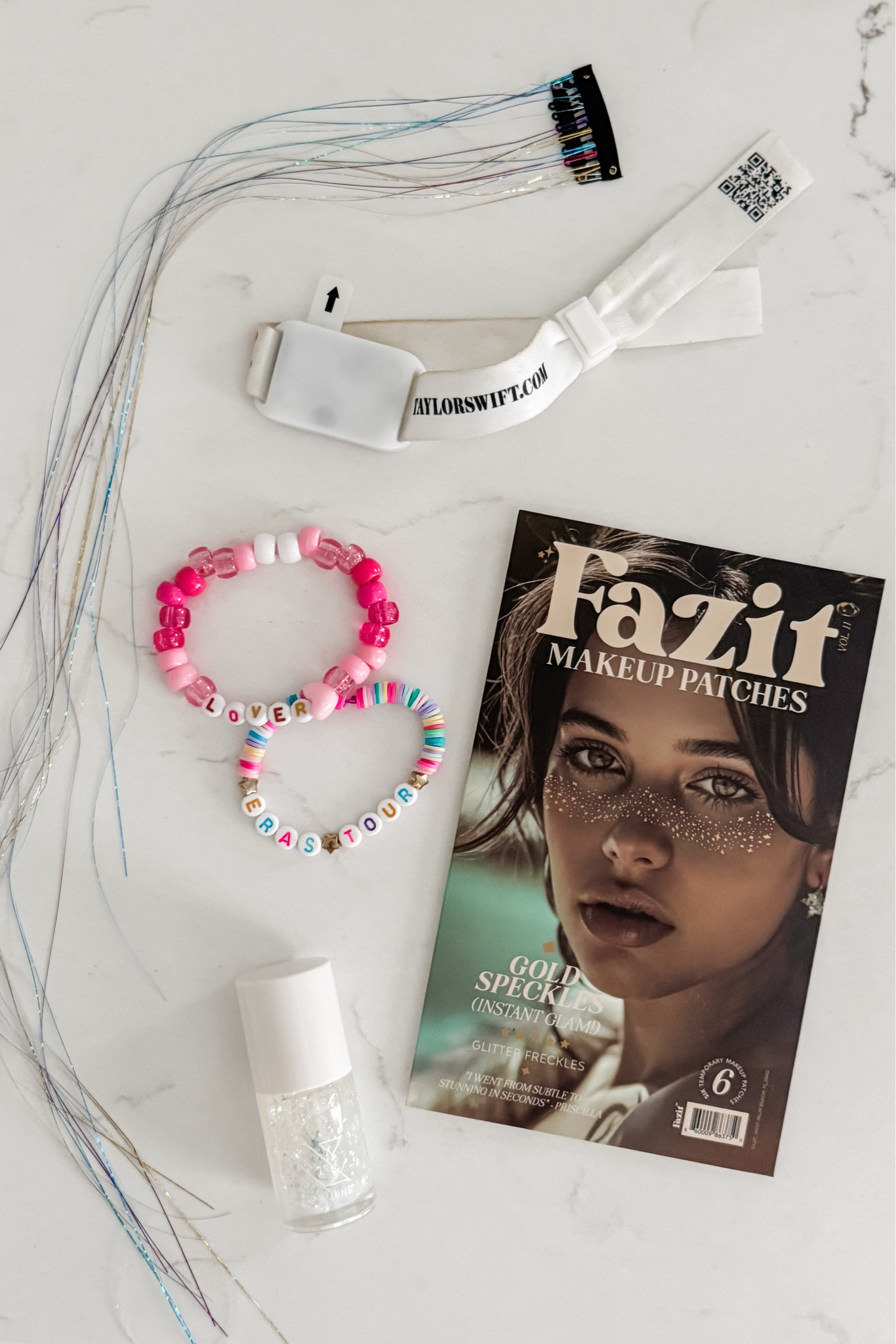 Since my outfit for the #ErasTour is geared more toward warmth and not sparkle, I’m bringing the ✨shimmer✨ in my accessories!