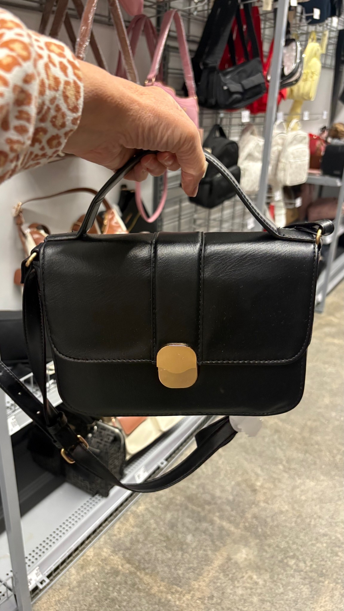 I like bags with options. This has a handle and a crossbody strap!