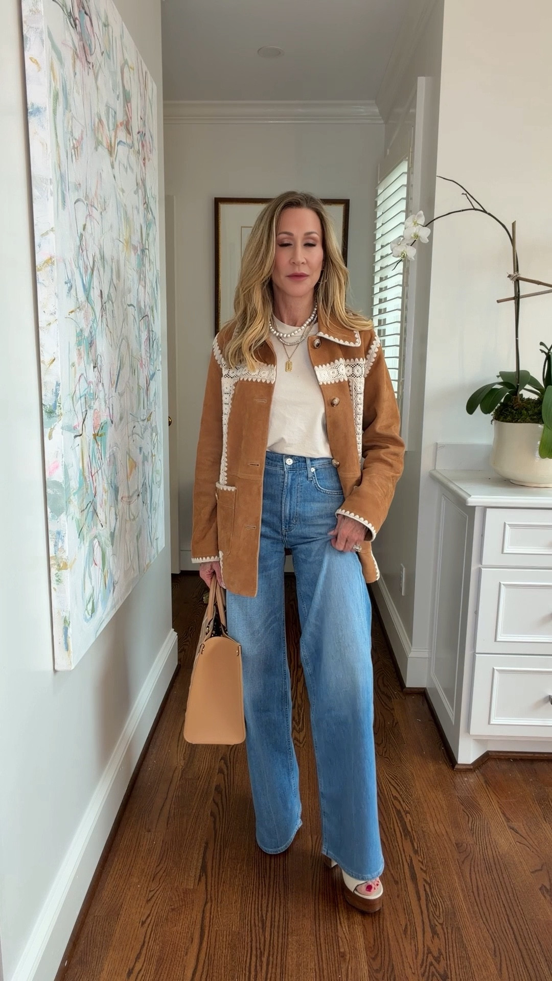 Wearing a gorgeous embroidered suede jacket from Sea New York with wide leg Mother jeans, platform sandals, a tan tote and long sleeve crew neck tee.


#LTKOver40 #LTKootd #LTKSeasonal