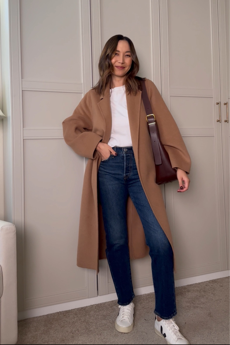 Casual way to style straight leg jeans 

• Levi’s wedgie straight leg jeans in the 28” length (I’m 5’4”) 
• mango camel coat - xs 
• everlane tee 
• veja sneakers 

#LTKSeasonal #LTKStyleTip