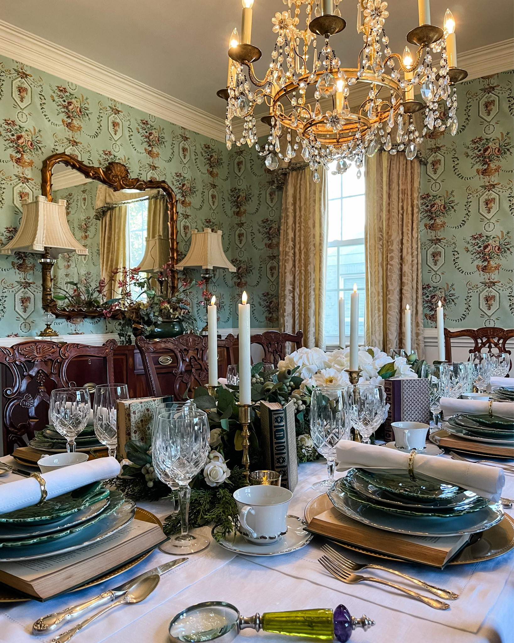 Book lovers, this one’s for you! 📚 If you could set the table with any book as your “charger plate,” which one would it be? Drop your all-time favorite read below—I need some new inspiration! 📚

I’m reminiscing over last year’s book club-inspired tablescape, so naturally, I had to bring it to life. It was a table layered with literary charm, each plate a new chapter, and a towering stack of dishes resembling a beloved book pile. Who needs a centerpiece when your tablescape tells a story? 📚

Do you host book club gatherings where the discussion is as rich as the food? Tell me about the books that have sparked the best conversations, the ones that made you laugh, cry, or gasp out loud. Let’s swap recommendations and dream up more storybook-worthy tables. 📚

As winter lingers, remember that you can create warmth indoors—where candlelight flickers over well-worn pages, comfort food fills the air, and conversations flow as easily as the next plot twist. Here’s to evenings filled with good company, great books, and even better vibes! 📚🕯️

#BookishTablescapes #DinnerWithAStory #CozyBookNook #TablescapeGoals #WinterGatherings

#LTKParties #LTKHome