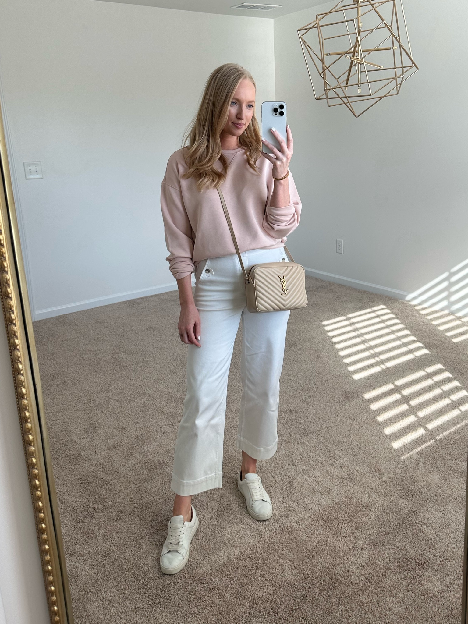 Casual weekend outfit / New Spanx airessentials crewneck I’m pale pink 😍 use my code AMANDAJOHNXSPANX for 10% off! Wearing a small in the sweatshirt and white cropped pants 