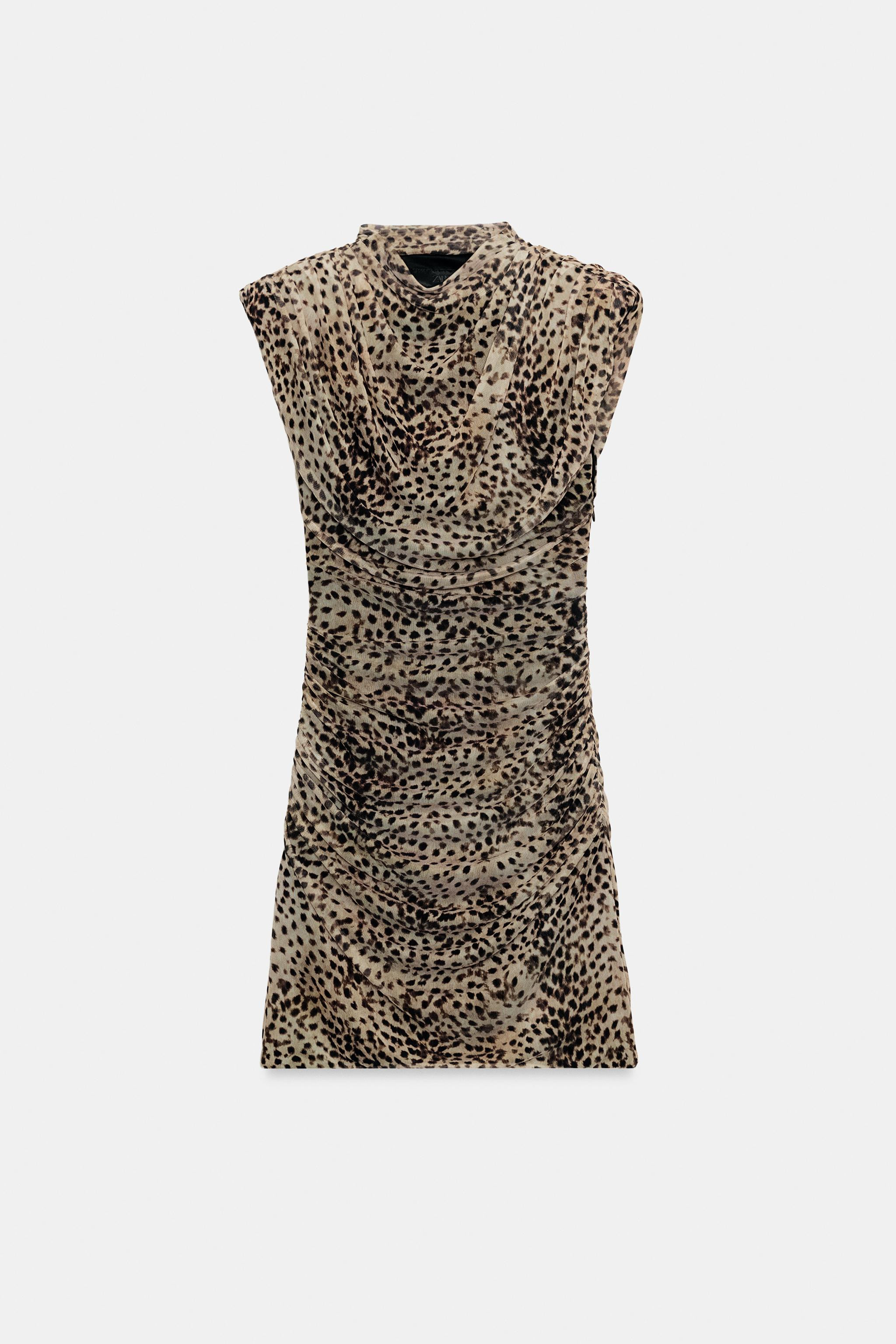 Sleeveless mini dress featuring a straight neckline and shoulder pads. Draped fabric detail. Feat... | Zara US