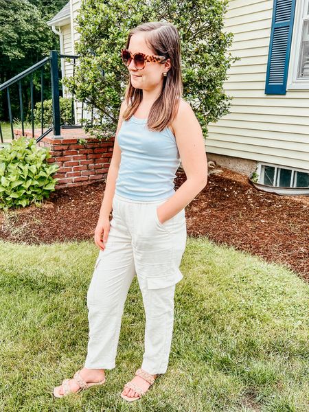 Wearing a in tank and pants - tts!
Sandals are wide and comfy, tts 
Sunglasses $15
Earrings $8
Tank $6
Pants $28 
Sandals $30



#LTKWorkwear #LTKSummerSales #LTKFindsUnder50
