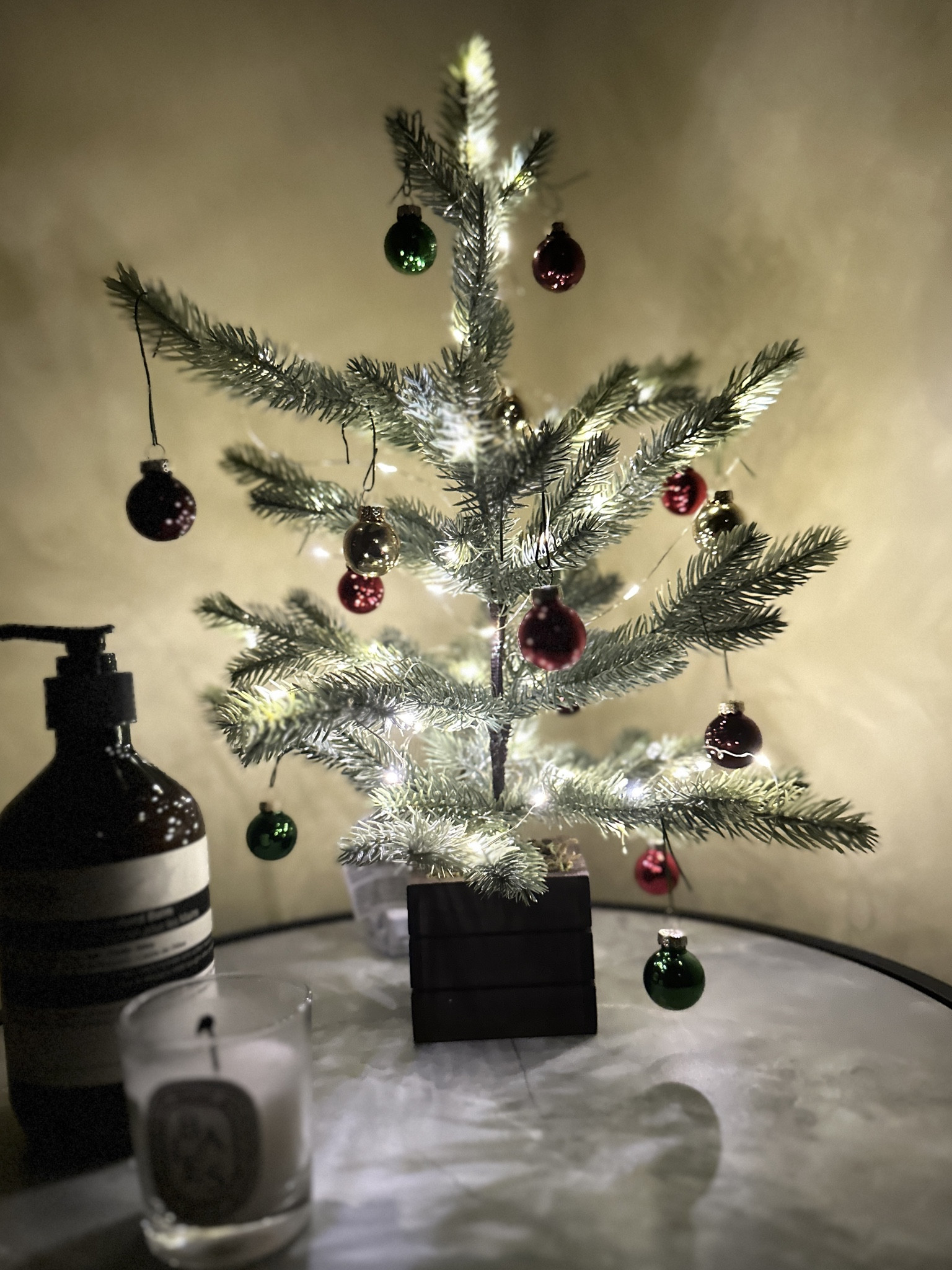 A touch of whimsical Christmas in the powder room with this table top Christmas tree that I added LED string lights and mini glass Christmas ornaments. 

Target holiday // powder room decor // holiday decor // affordable Christmas decor // diptyque // Aesop hand balm

#LTKfindsunder50 #LTKhome #LTKHoliday