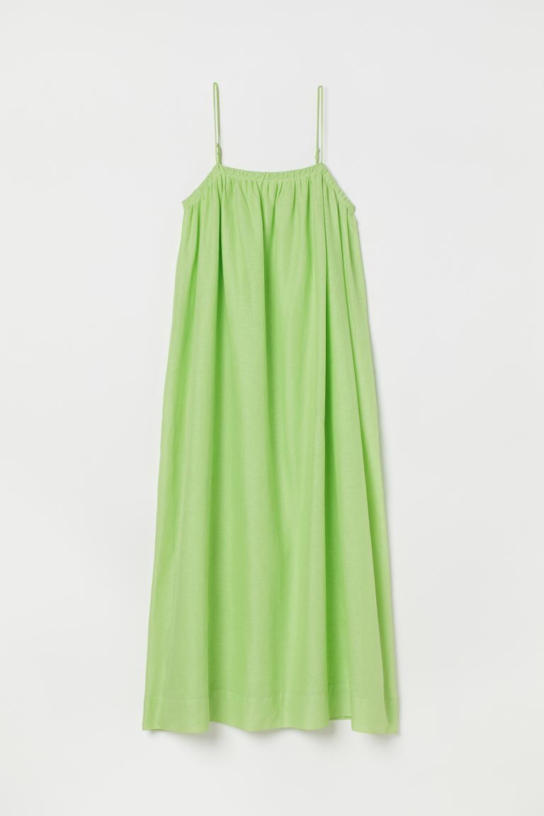 Wadenlanges Kleid in A-Linie aus einem leichten Leinen-/Baumwollmischgewebe. Modell mit voluminö... | H&M (DE, AT, CH, DK, NL, NO, FI)