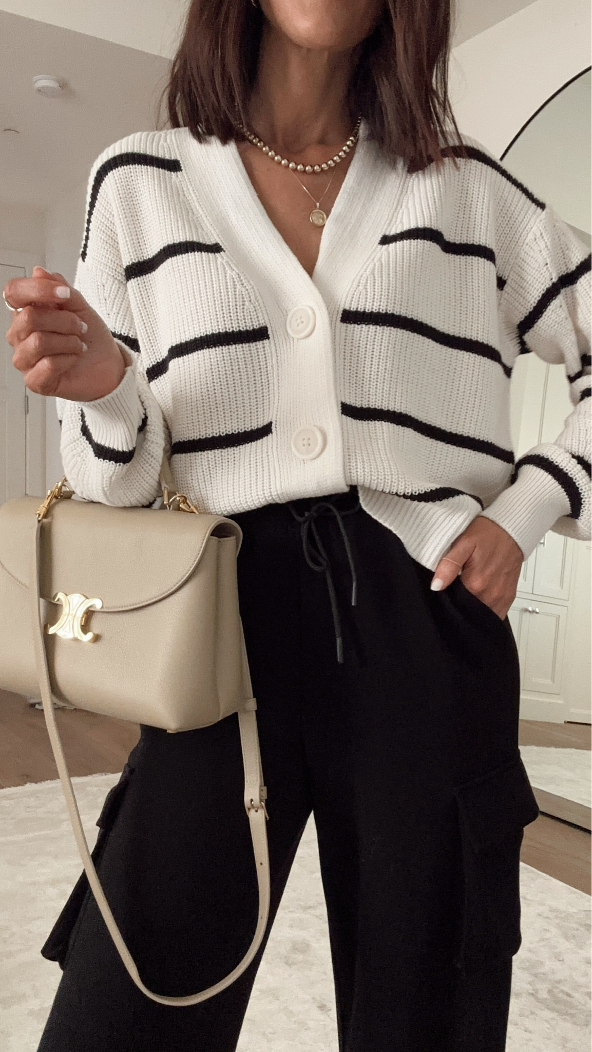 This target cardigan is so good and budget friendly! I'm just shy of 5/7"
wearing a size small✨ #stylinbyaylin #aylin

#LTKItBag #LTKSeasonal #LTKStyleTip