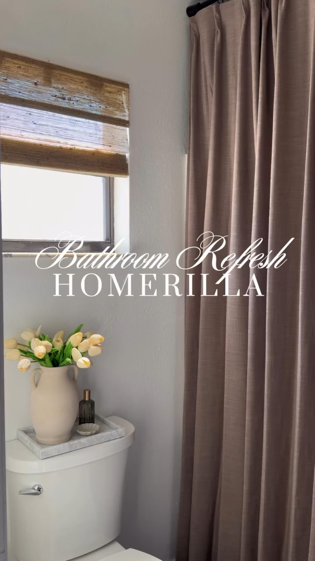 Bathroom Refresh 🤎🌿✨ 
Comment “SHOP” for link 

Curtains:
Lille Linen Memory
Color: Oak Dim Grey
Pinch Pleat - Double
Lining Type: 90% Blackout 
Memory Training: Yes

Bamboo Shades Details:
Natural Bamboo Roman Shades Light Filtering
Color: Jute
Mounting Type: Inside 
Edge Binding: No Edge Binding

#bathroom #interiors #homerilla #curtains #customshades