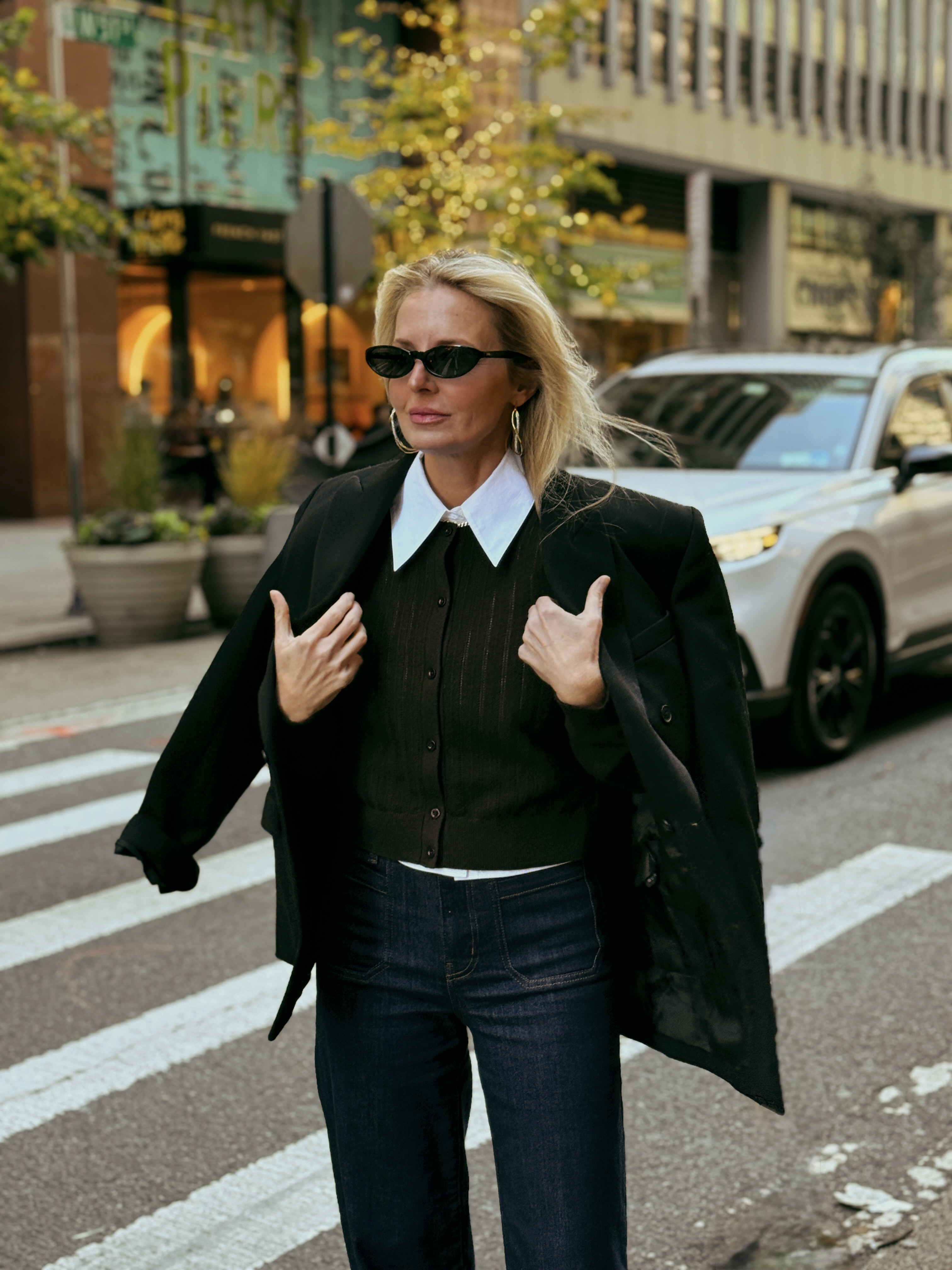 Three layers that work together perfectly; white sleeveless shirt, brown cashmere cardigan, black blazer. The white collar creates a focal point at the neckline, the cashmere adds texture and warmth, and the blazer grounds the whole look. 

FRAME dark wash wide leg jeans pull it all together below. This is what intentional dressing actually looks like.

#LTKgrwm #LTKOver40 #LTKSaleAlert