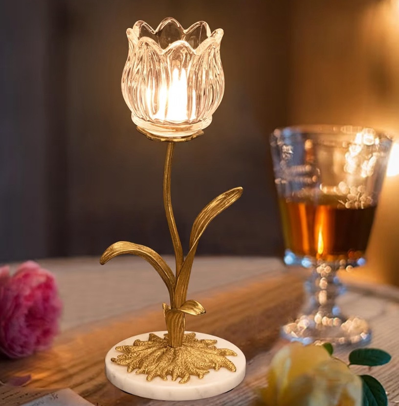 Glass Rose Shaped Brass candle holder with  marble base 
Use with tea light or votive candles… perfect for a wedding, shower or a romantic dinner outside, garden party etc  😍😍