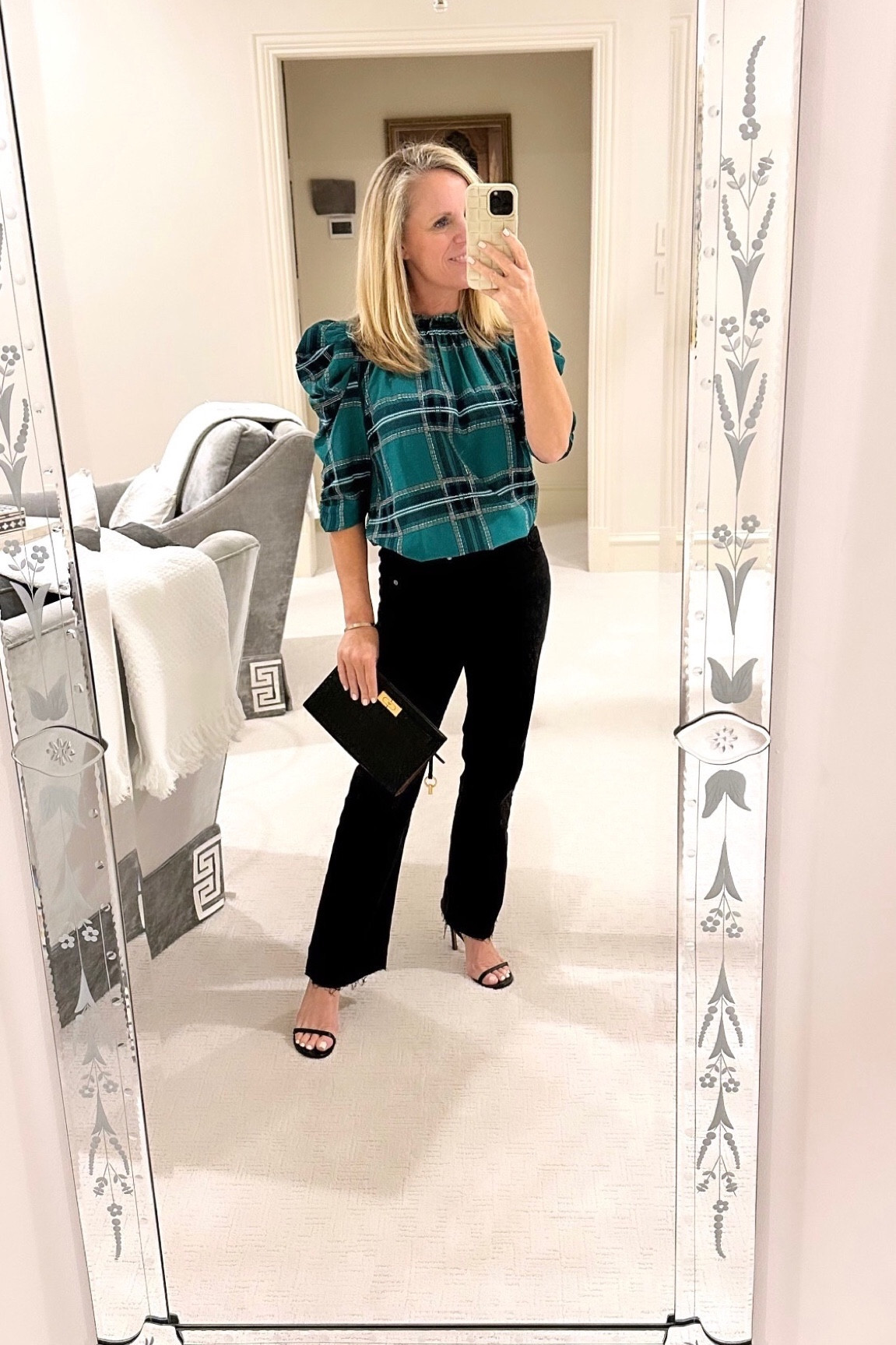 Darling emerald green, tartan plaid blouse with puff sleeves
Best most flattering black denim with raw hem
Black heel sandals 
Black clutch 
Casual holiday party look 
Girls night out


#LTKHoliday #LTKover40 #LTKstyletip