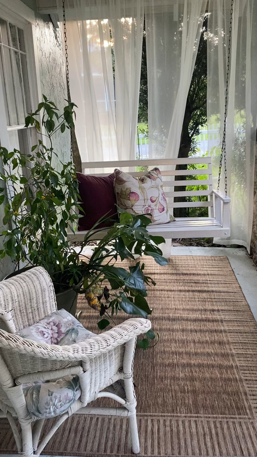 Porch time 
Love this outdoor rug and sheer curtains 

#LTKVideo #LTKFindsUnder100 #LTKHome