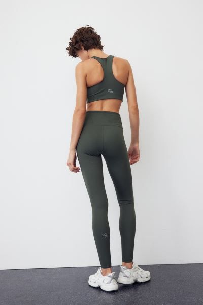 DryMove™ Sports Leggings - Dark khaki green - Ladies | H&M US | H&M (US + CA)