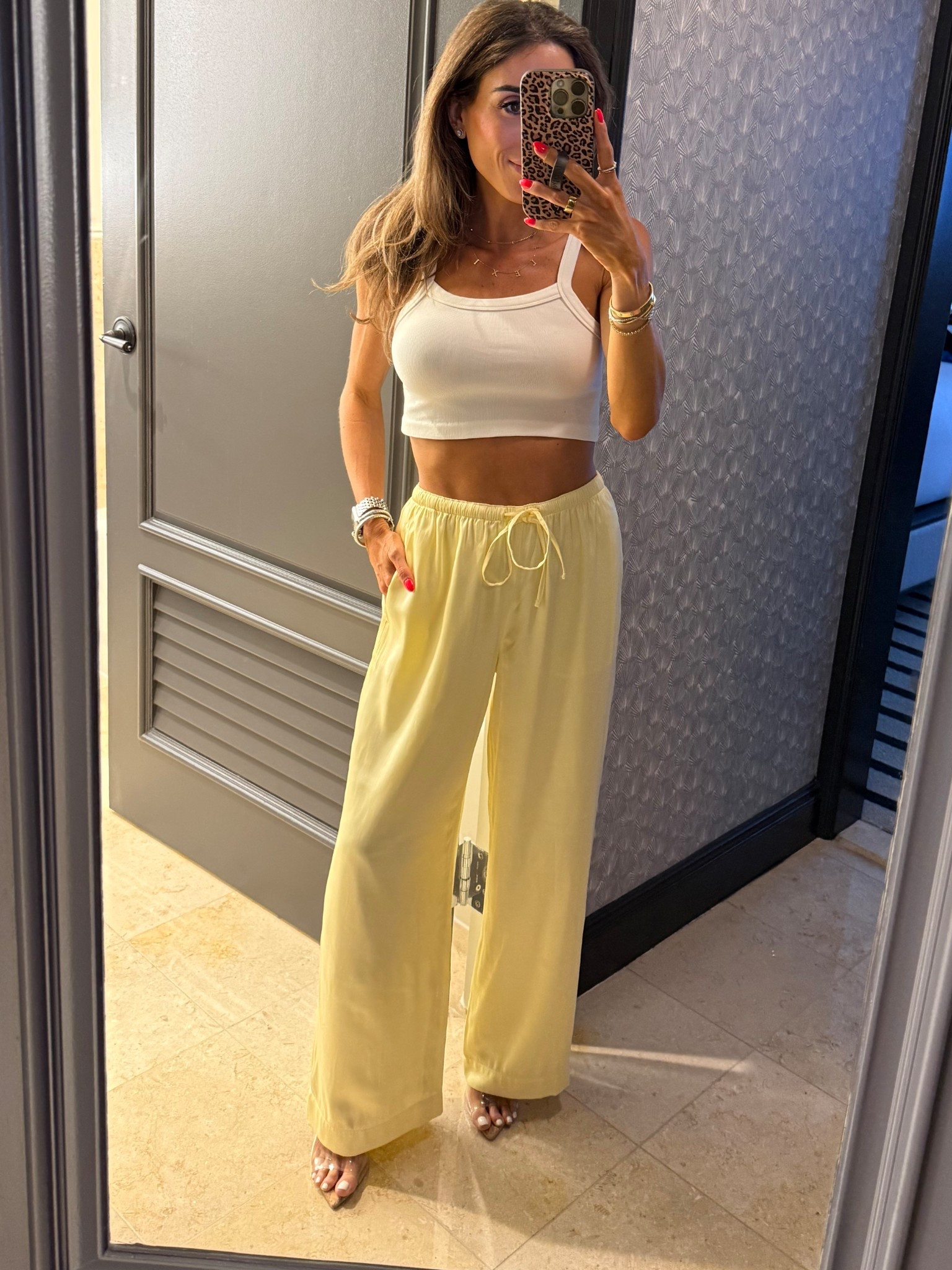 Trending yellow satin pants petite friendly and I found a similar pair in stock! Paired with an easy white tank size xs 

#LTKSeasonal #LTKPetite #LTKootd