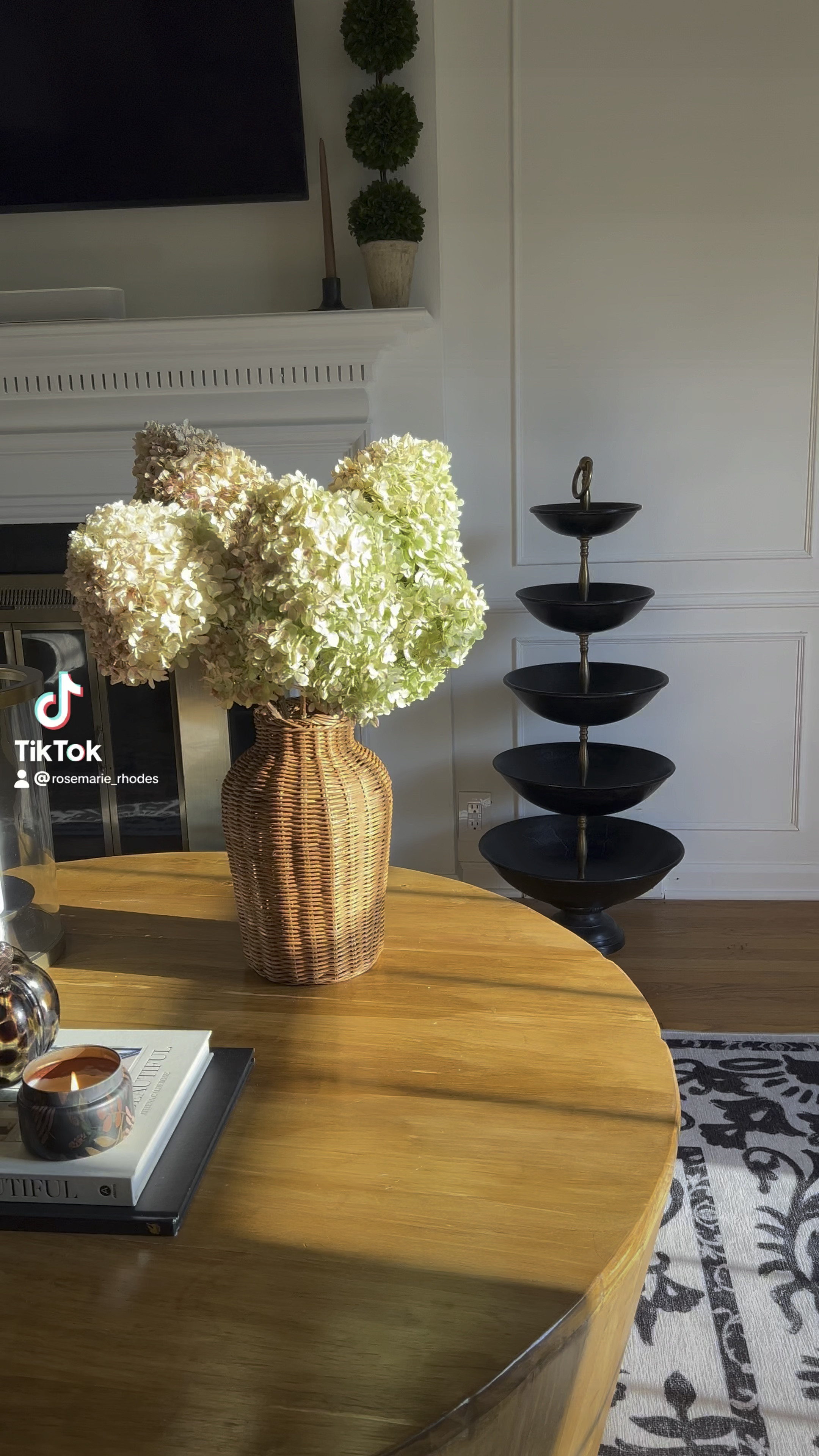 Rattan vase with real hydrangea stems, Anthropologie Capri Blue pumpkin clove, World Market blown glass in tortoise, and coffee table books 


#LTKHome #LTKSaleAlert #LTKSeasonal