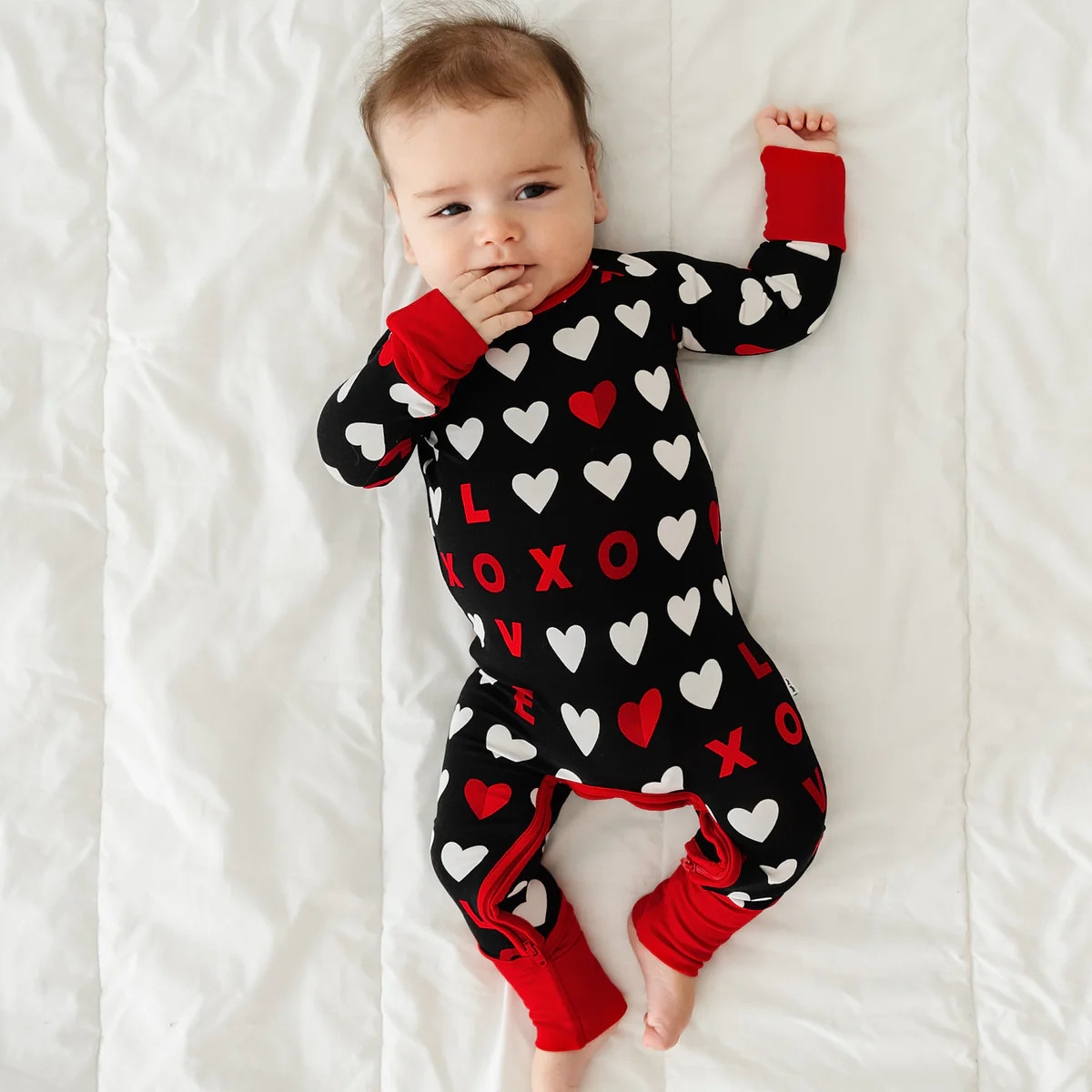 Black XOXO Crescent Zippy | Little Sleepies