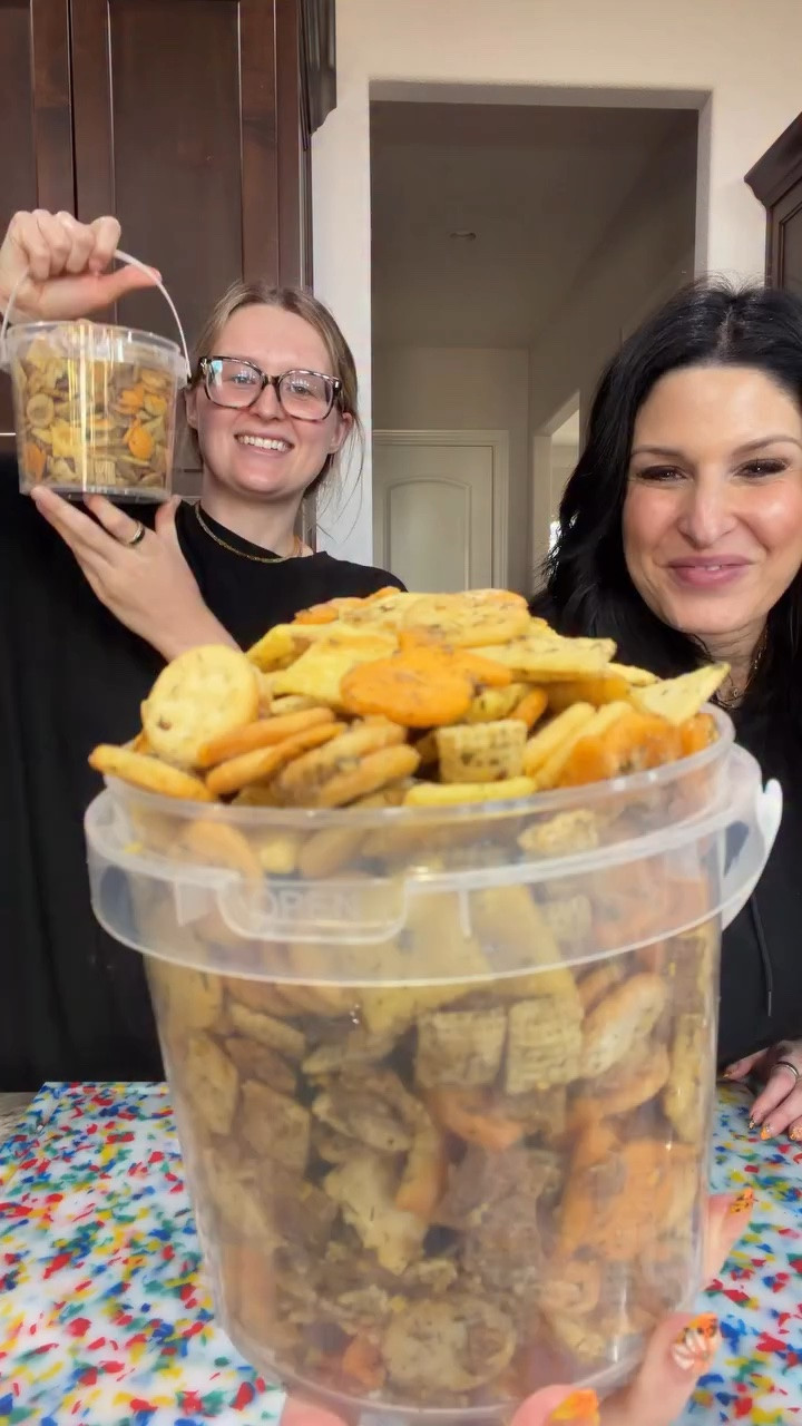 🥒✨ PICKLE PARTY MIX ✨🥒

SEND THIS TO YOUR PICKLE-LOVING FRIENDS because they will love you forever. 😂💚

This is the snack mix you NEED for get-togethers, football games, parties… or honestly just sitting on the couch demolishing an entire bowl. 😂 It’s crunchy, ranchy, DILL PICKLE GOODNESS and dangerously easy to keep eating.

🥒 INGREDIENTS:
• 2 cups Rice Chex
• 2 cups Wheat OR Corn Chex
• 2 cups Club Mini Crackers
• 2 cups White Cheddar Cheez-Its
• 2 cups Ritz Peanut Butter Bits
• 2 cups Ritz Cheese Bits
• 2 cups Cheddar Goldfish
• 3 packets Ranch Seasoning
• 1 1/3 cups neutral oil (canola, grapeseed or vegetable)
• 1/2 cup pickle juice
• 2–3 tbsp Grill Mates Dill Pickle Seasoning OR your favorite pickle seasoning
• 1 tbsp dried dill

🥒 LET’S MAKE IT:

1️⃣ MIX IT UP:
Add all of your crackers, cereal and snacks to a LARGE tray or mixing bowl.

2️⃣ MAKE IT PICKLEY:
Pour over the oil and pickle juice. Add 2 tbsp pickle seasoning + 2 packets ranch seasoning. Gently toss REALLY well so everything gets coated without crushing your snacks.

3️⃣ SPREAD IT OUT:
Line 2 large baking sheets with foil and divide the snack mix evenly between them.

4️⃣ MORE SEASONING, OBVIOUSLY 😂:
Divide the remaining ranch packet between both trays and sprinkle with the dried dill. Want it EXTRA pickle-y? Add a little more pickle seasoning here too! 🥒

5️⃣ BAKE:
Bake at 250°F for 15–20 minutes, gently tossing everything halfway through.

6️⃣ COOL + CRUNCH:
Let it cool completely and then… CRUNCH AWAY. 😂🥒💚

⚠️ Consider yourself warned: put a bowl down at a party and WATCH how fast this stuff disappears. 😂

If you make our Pickle Party Mix, COME BACK AND TELL US WHAT YOU THINK! 🥒💚 #picklepartymix  #pickle #snack #fallrecipes #footballsnacks