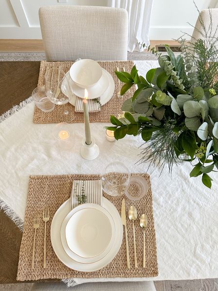 Simple Christmas or holiday table scape with white gold and green.
Pottery barn linen table throw, brass flatware, woven placemats

#LTKSeasonal #LTKhome #LTKHoliday