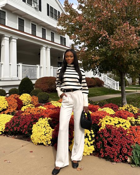 Love a neutral outfit! I wore this striped turtleneck sweater in Vermont! Styled with my Abercrombie pants and ballet flats! 

#LTKfindsunder100 #LTKSeasonal #LTKshoecrush